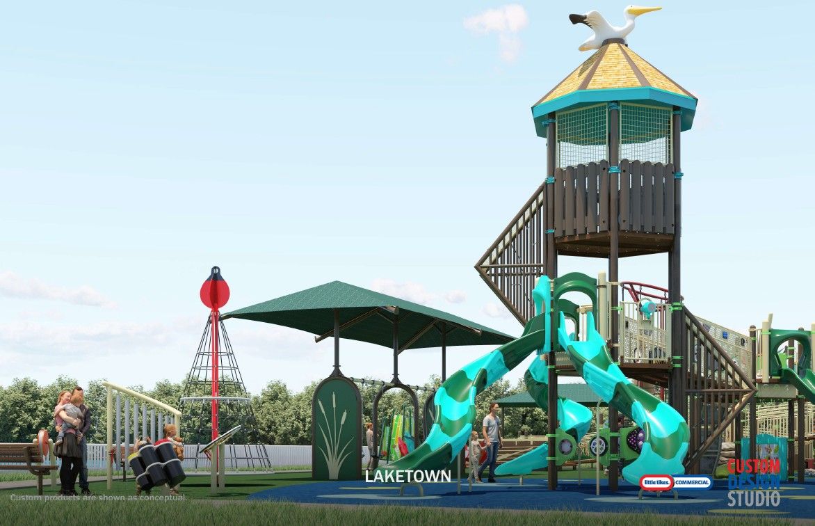 Image shows a tall playground with a bird sculpture on top.