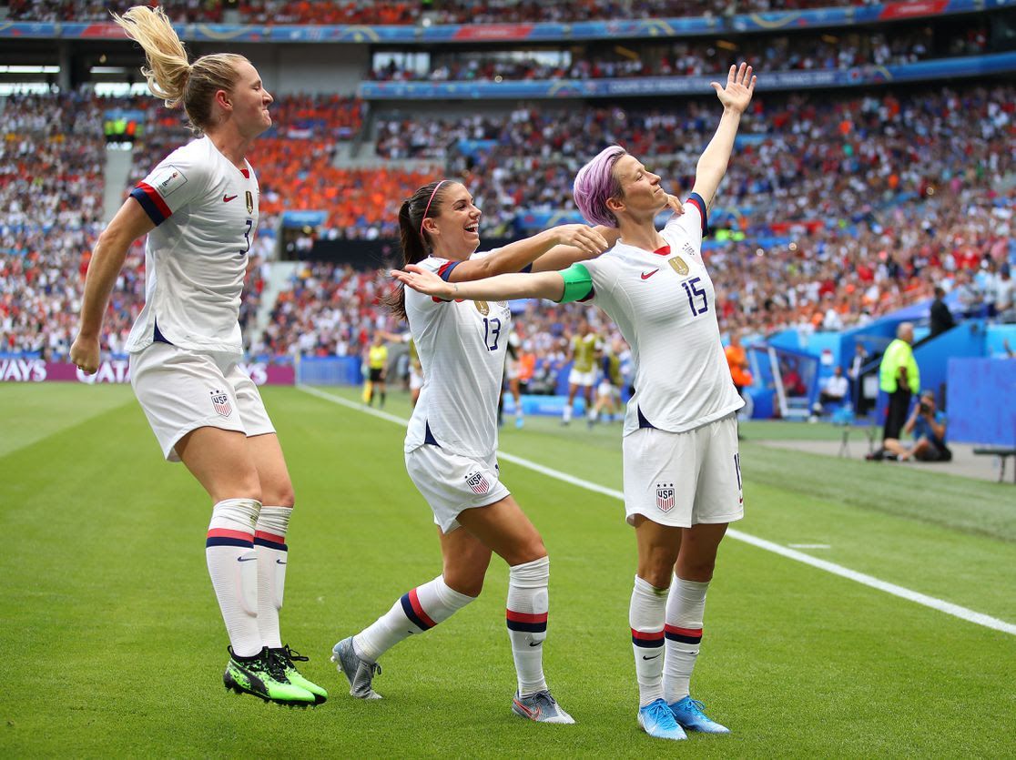 Women's national soccer team players celebrate during World Cup