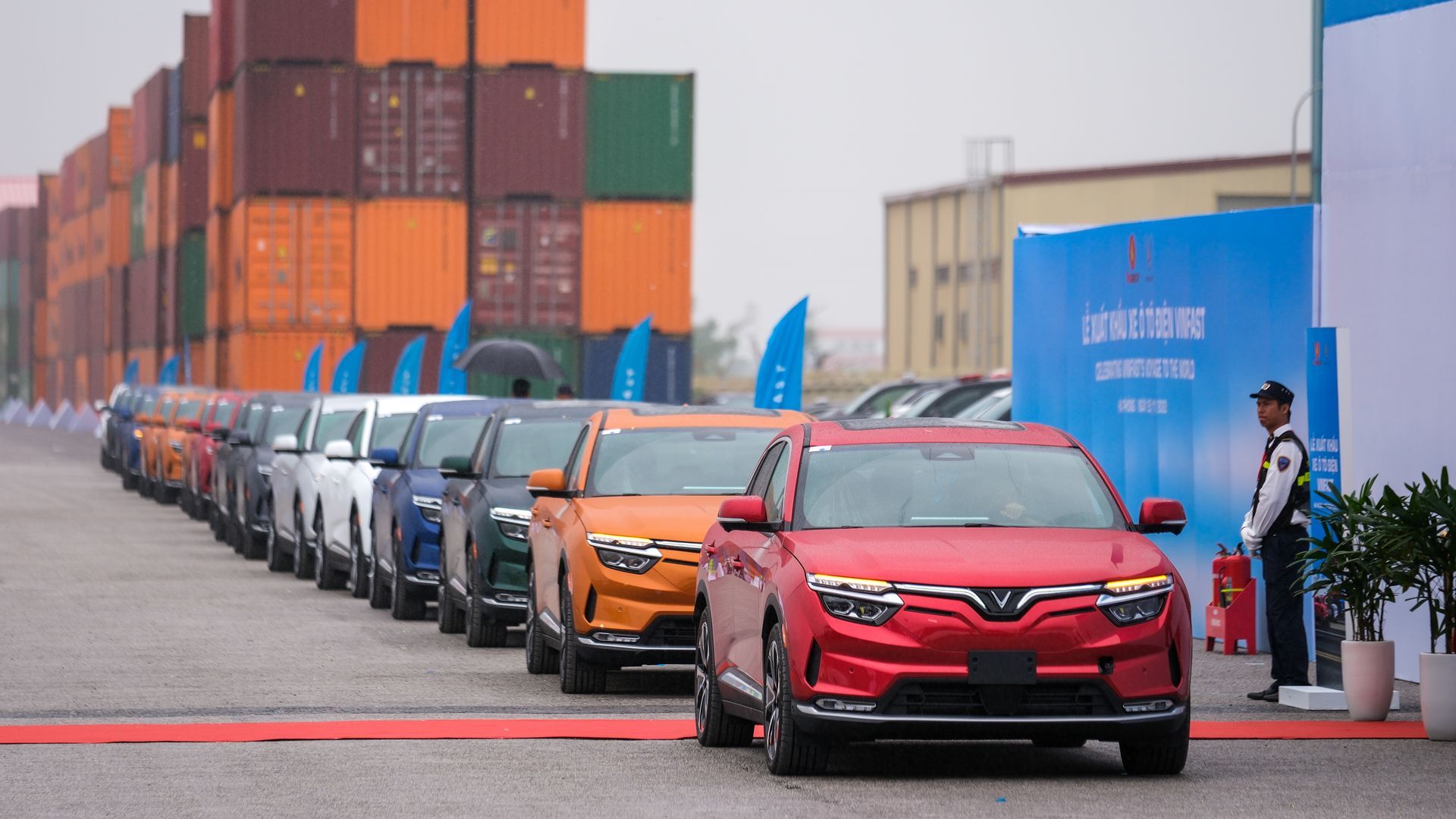 VinFast LLC's VF8 electric vehicles are loaded into a ship for export at a port in Haiphong, Vietnam, on Friday, Nov. 25, 2022. 