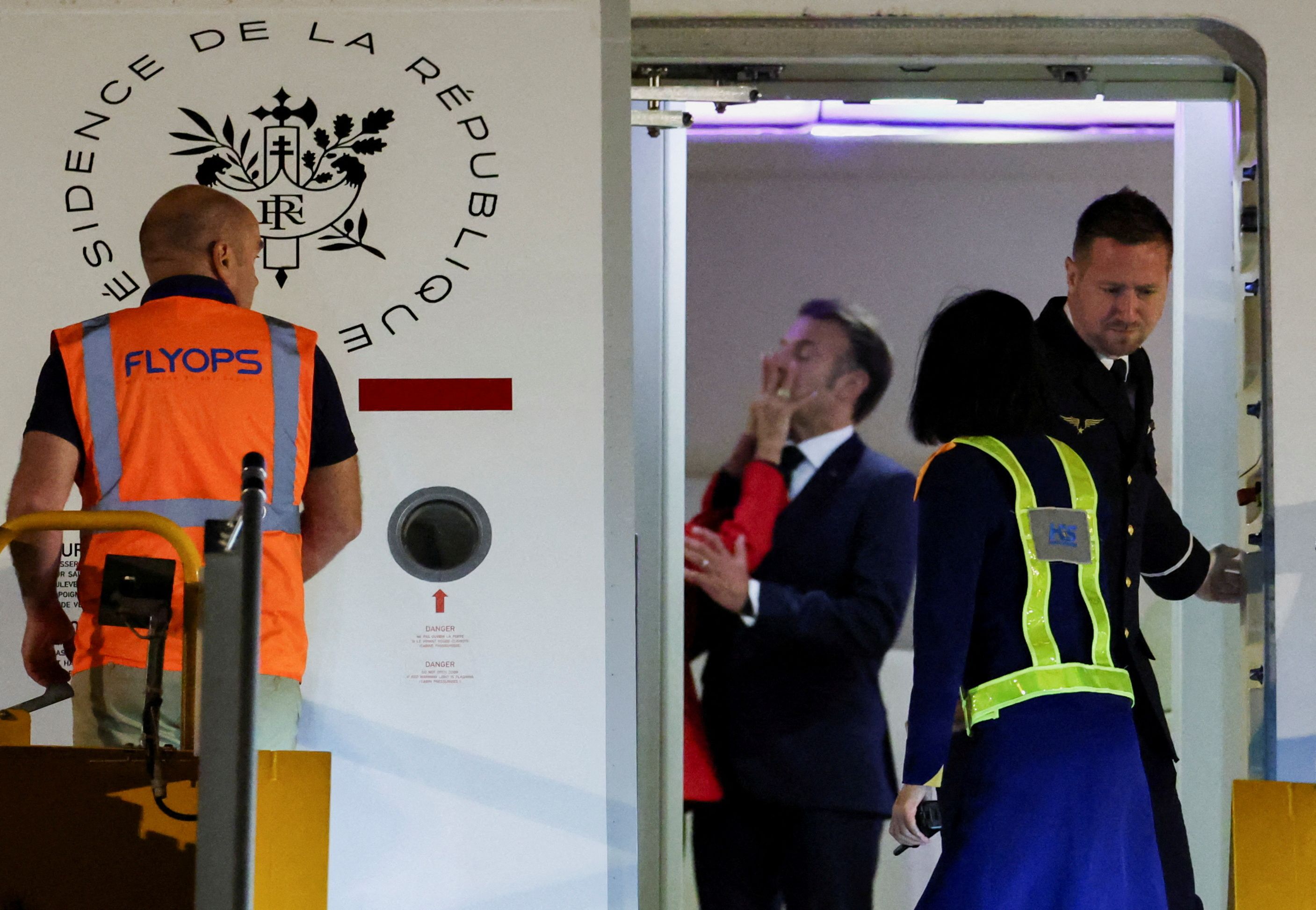 France's President Emmanuel Macron was pushed in the face by his wife Brigitte Macron as the couple arrived in Vietnam to begin a tour of Southeast Asia, at Noi Bai International Airport, in Hanoi, Vietnam.