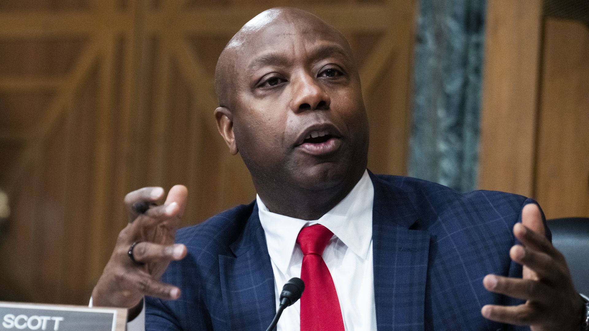 Sen. Tim Scott (R-SC) questions U.S. Federal Reserve Chair Jerome Powell as he testifies at a Senate Banking, Housing, and Urban Affairs Committee hearing.