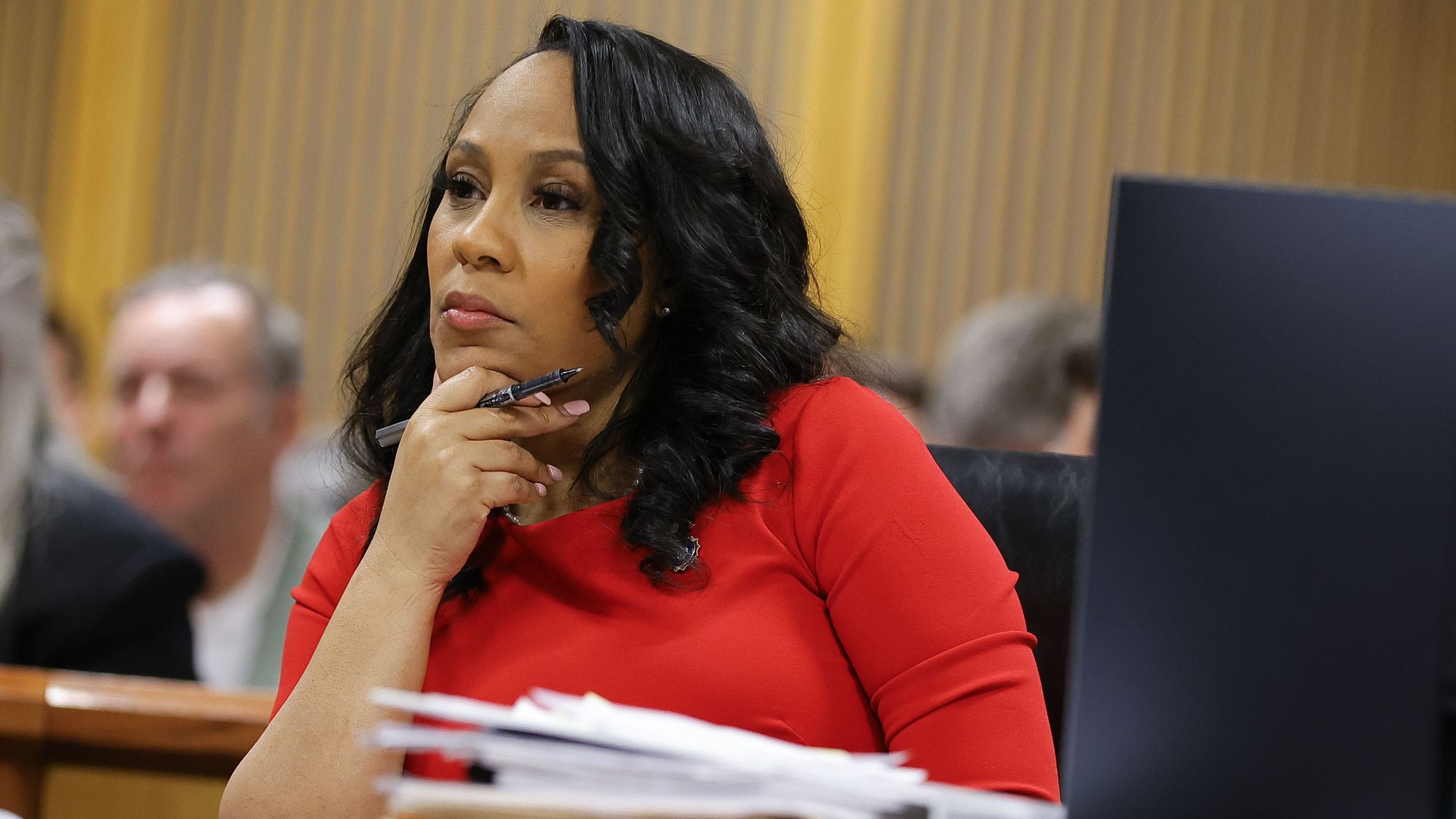  Fulton County District Attorney Fani Willis looks on during a hearing in the case of the State of Georgia v. Donald John Trump at the Fulton County Courthouse on March 1, 2024, in Atlanta, Georgia