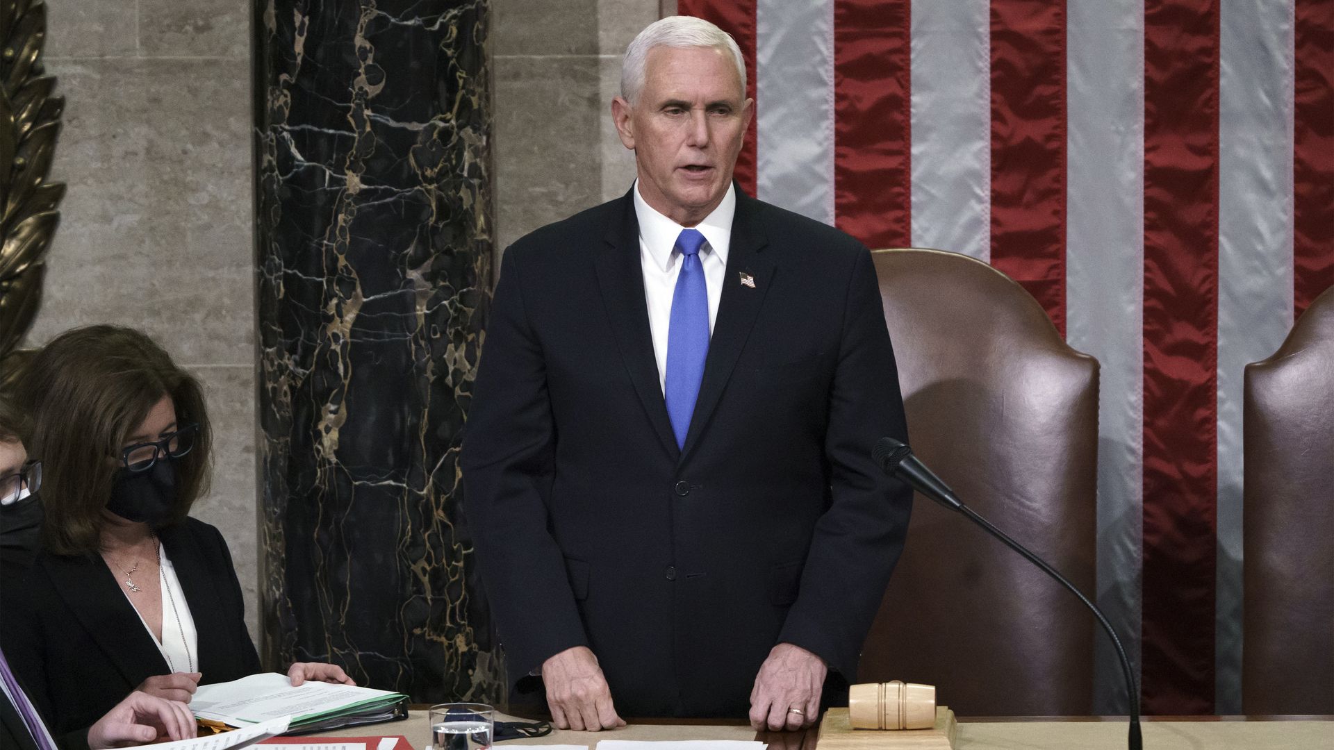 Vice President Mike Pence reads the final certification of Electoral College votes cast in November's presidential election during a joint session of Congress