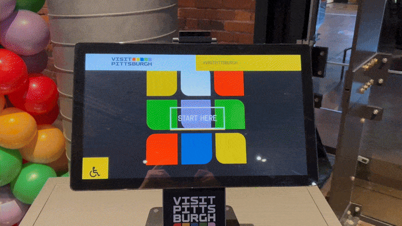 A GIF of a computer screen showing images of Pittsburgh changing rapidly