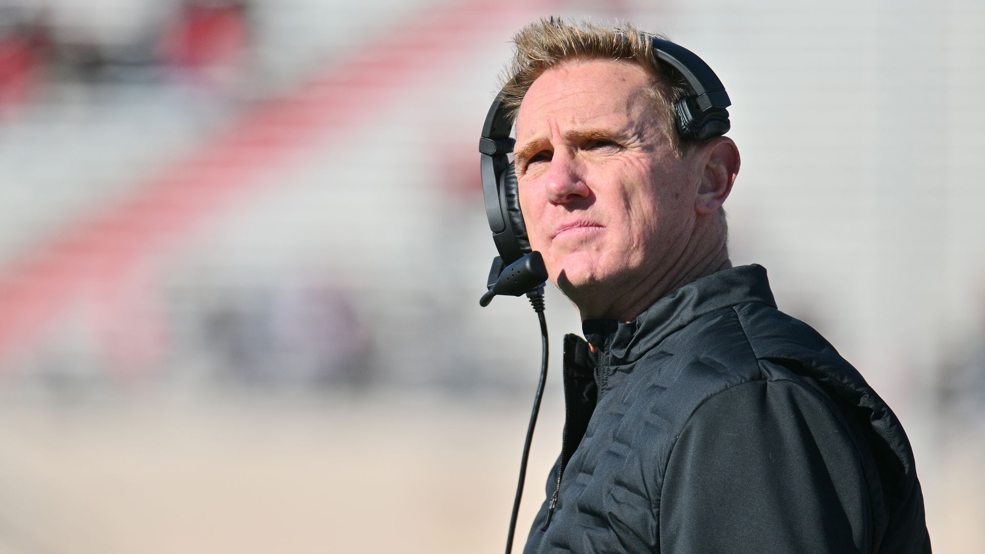 Head coach Blake Anderson of the Utah State Aggies looks on during the first half of their game at University Stadium on November 24, 2023 in Albuquerque, New Mexico