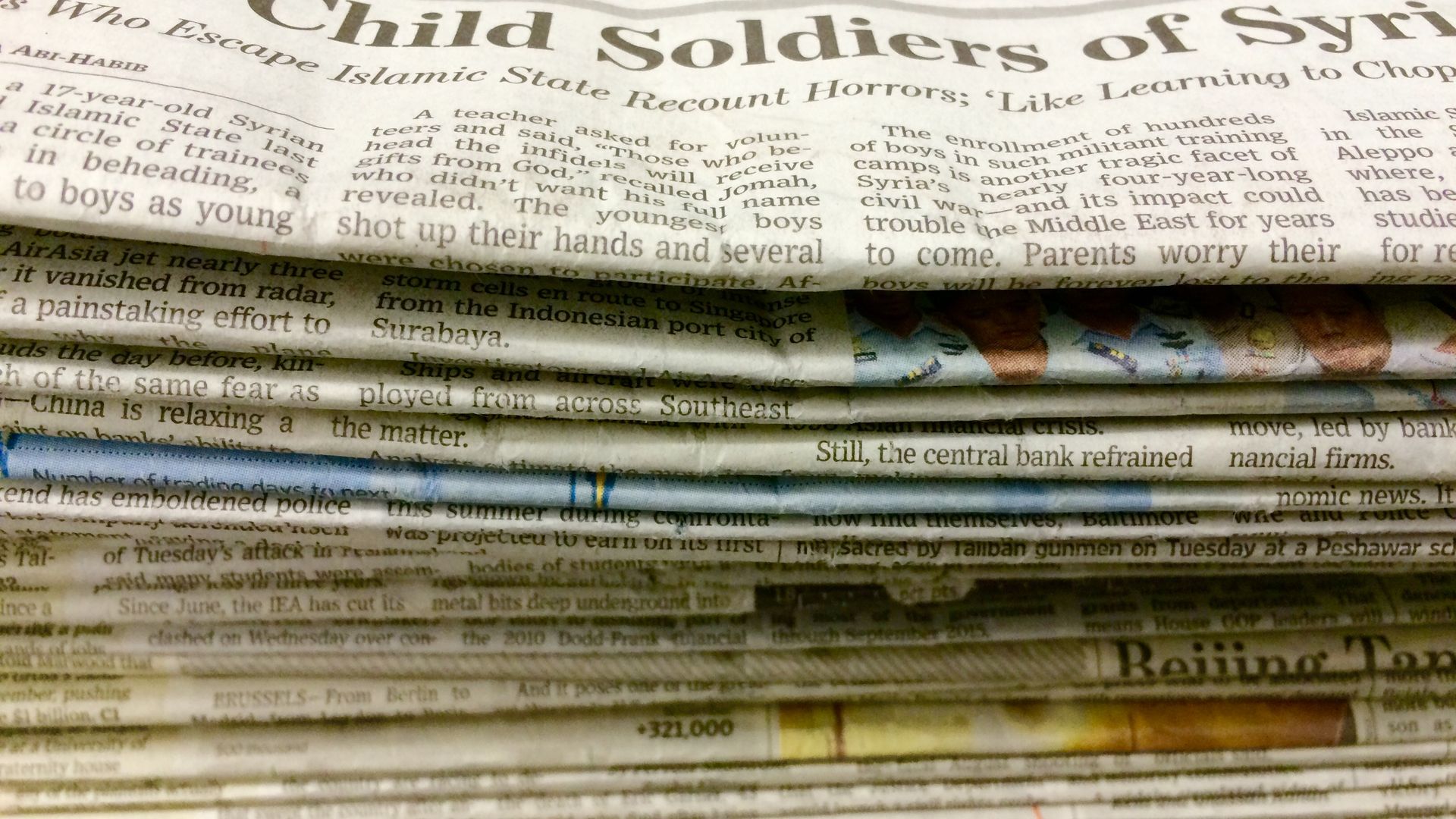 A stack of newspapers.