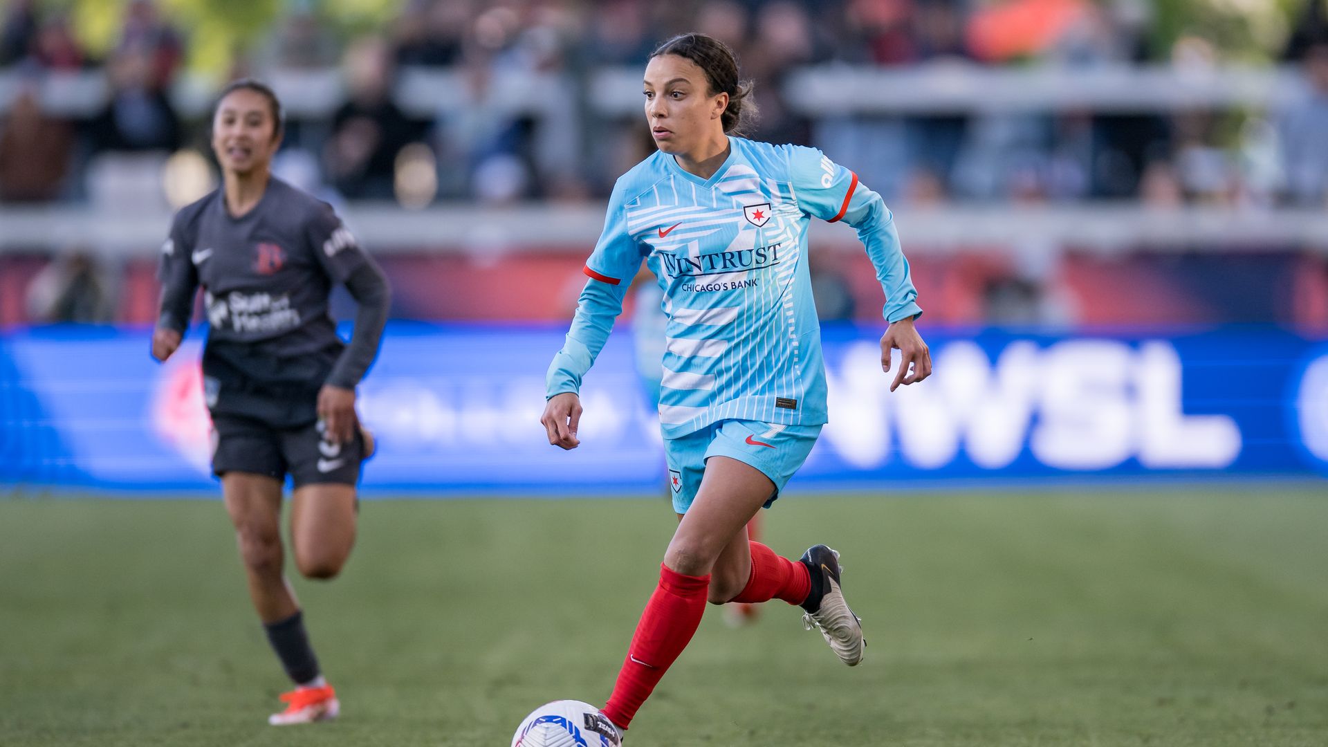 Photo of a woman playing soccer