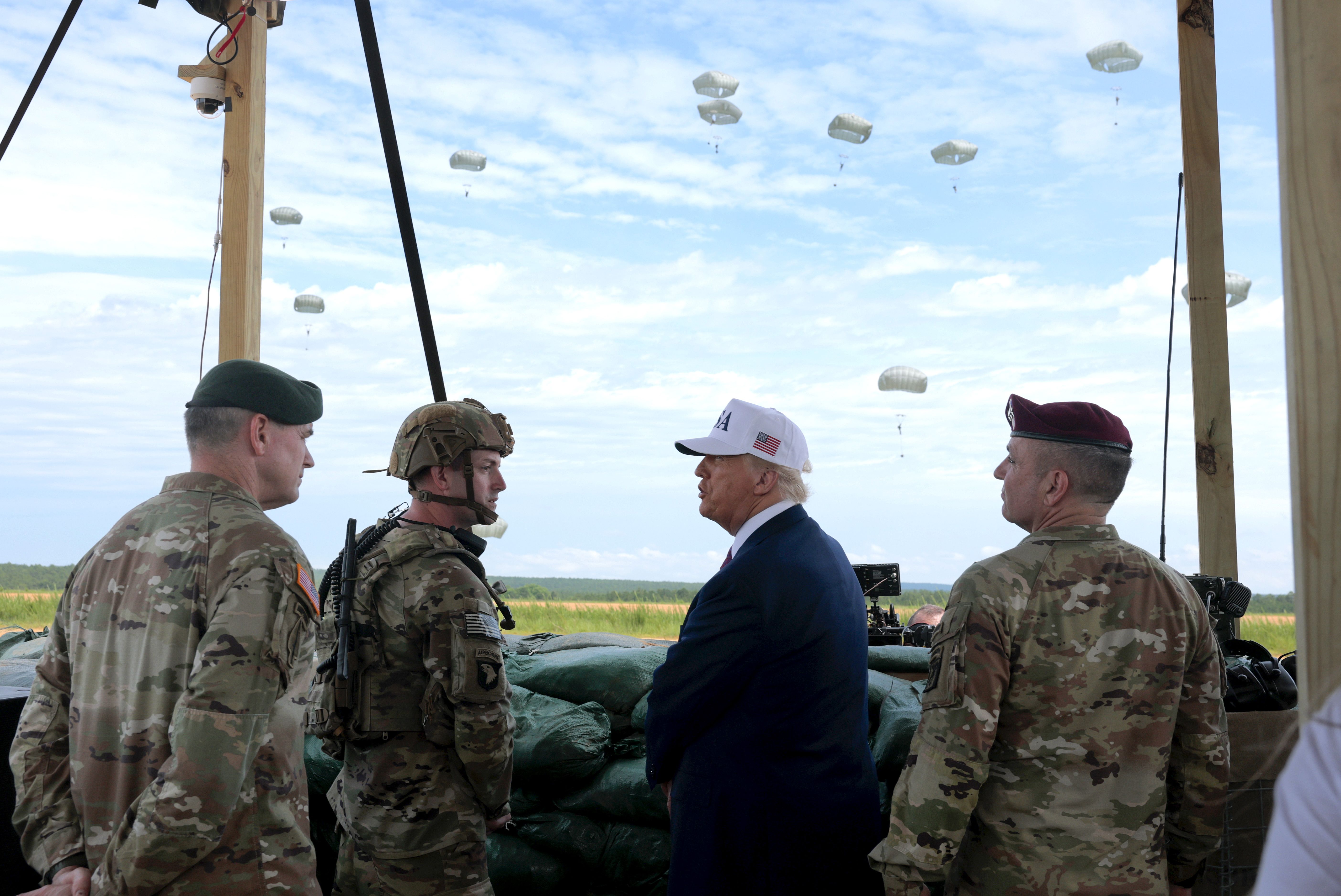 President Trump watches a demonstration by special operations soldiers yesterday in Fort Bragg, North Carolina.