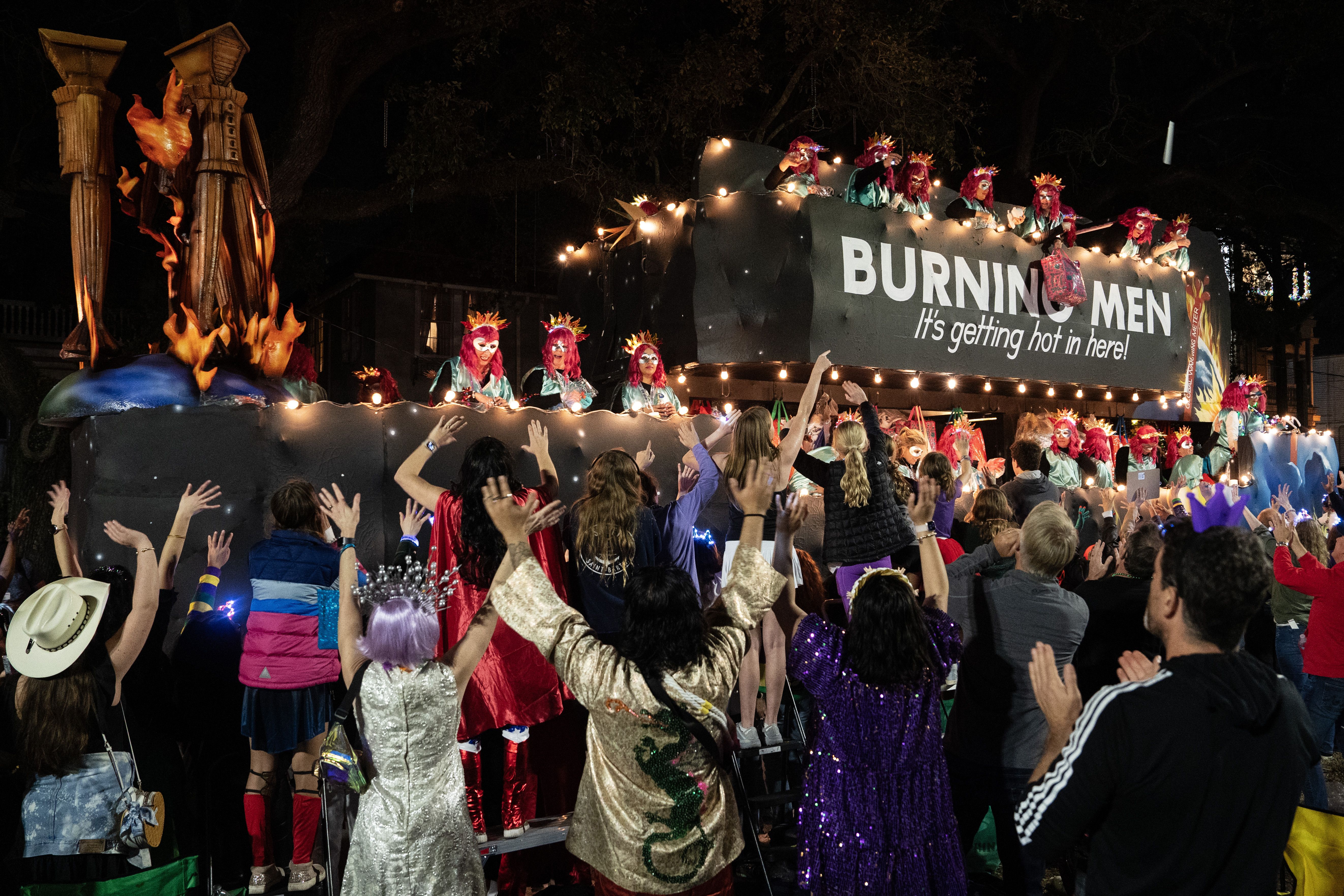 Photo shows a float in the Krewe of Muses parade
