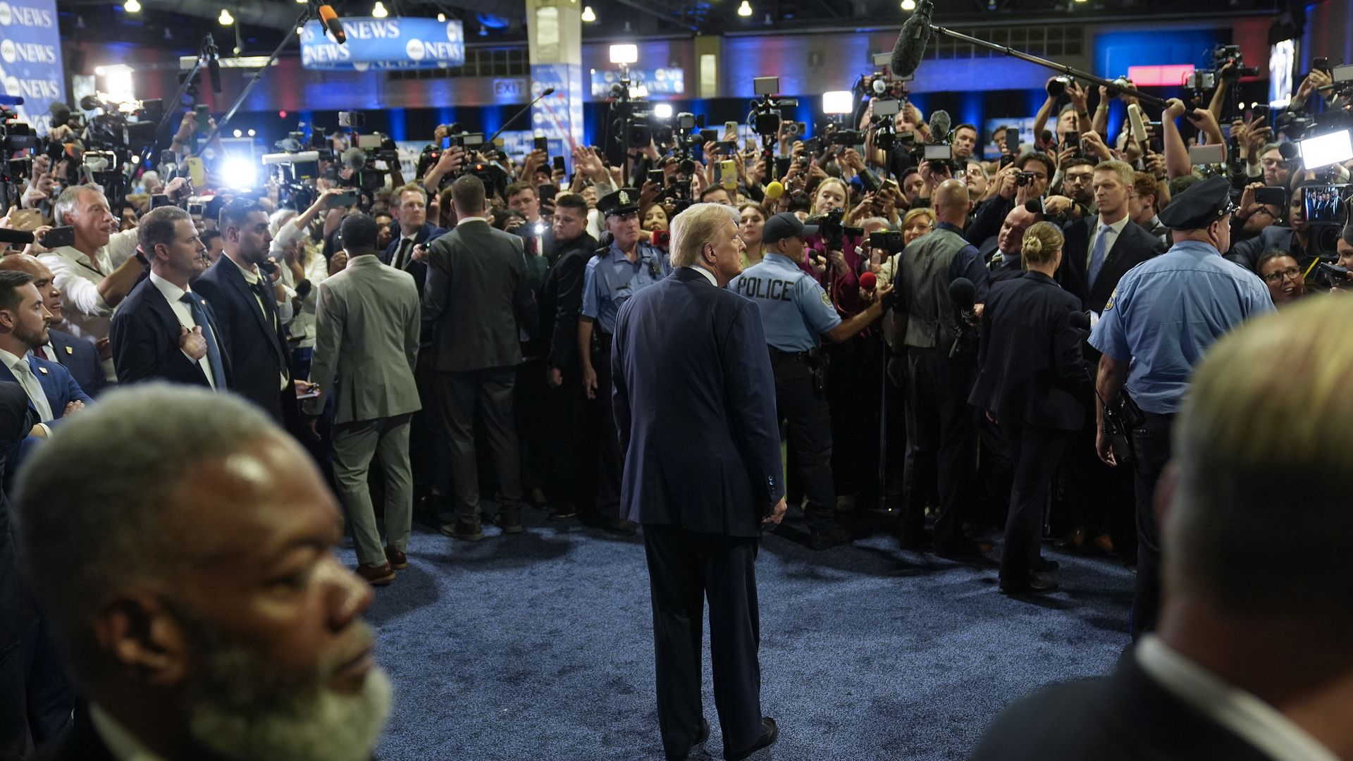 Former President Trump speaks to reporters in the spin room last night. 