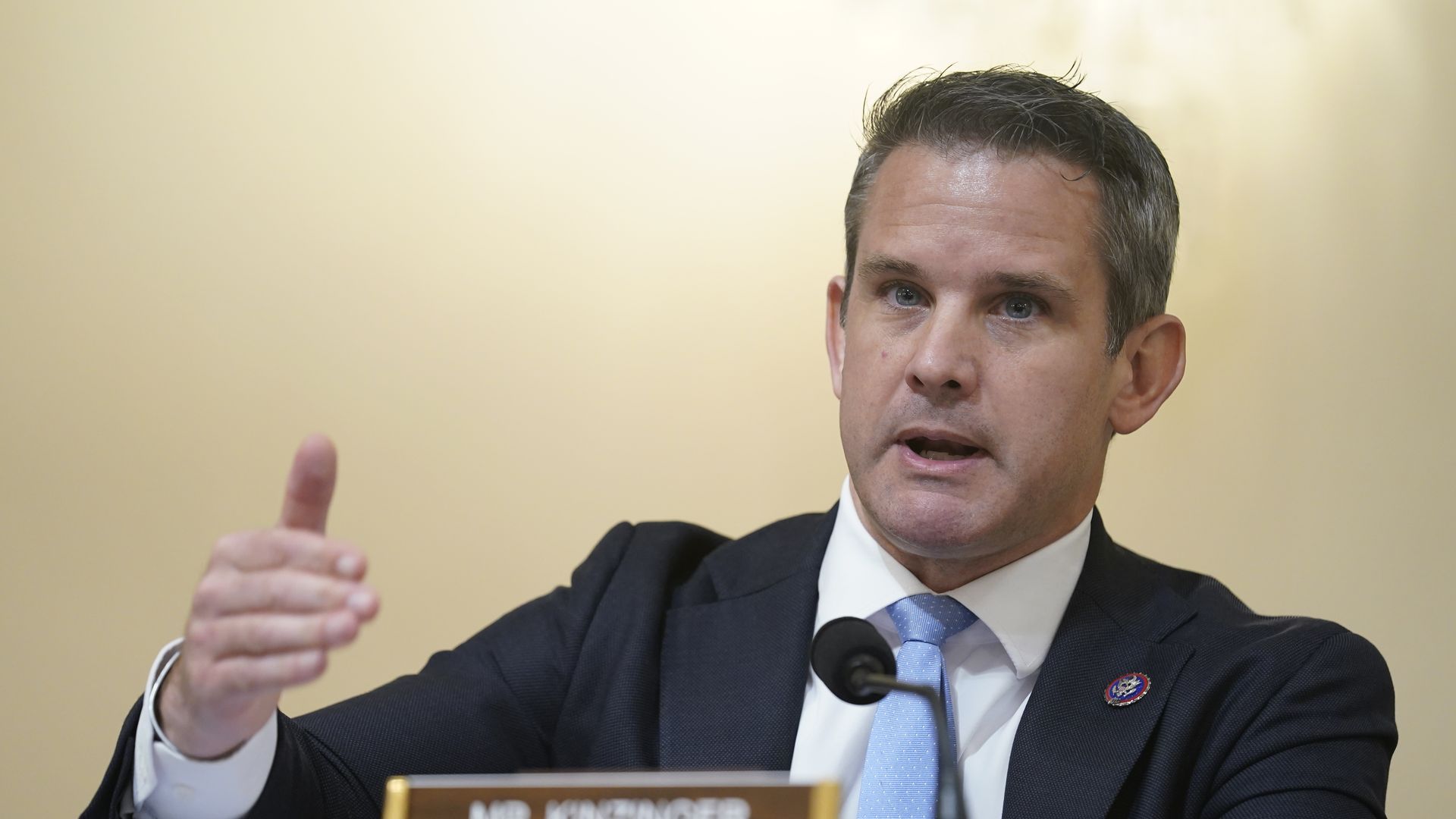 Photo of Adam Kinzinger speaking and gesturing with his right hand