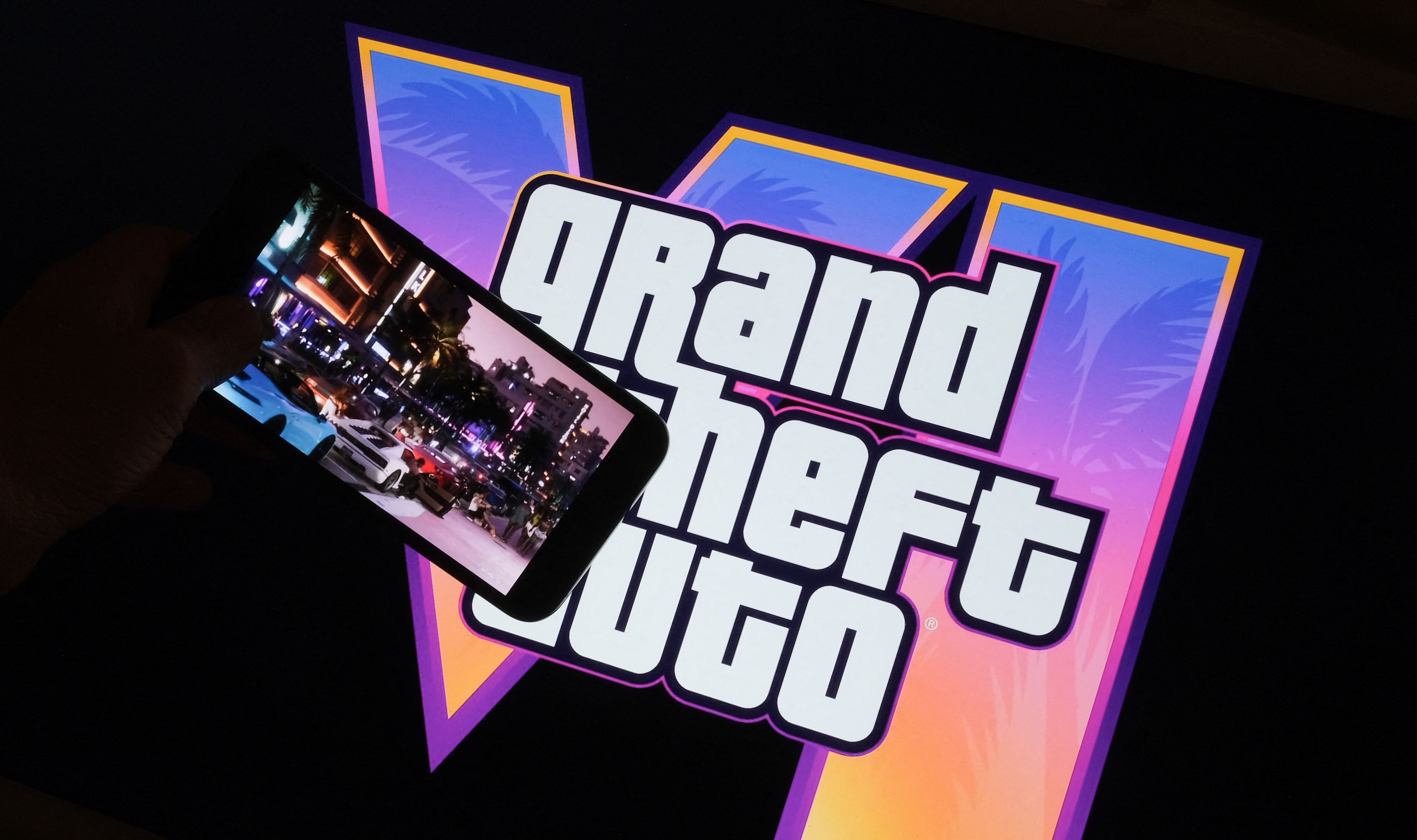 GTA VI logo with phone showing image