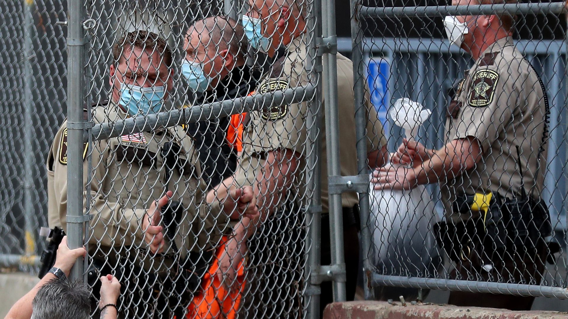 Law enforcement officials escorting former Minneapolis police officer Derek Chauvin in September 2020.