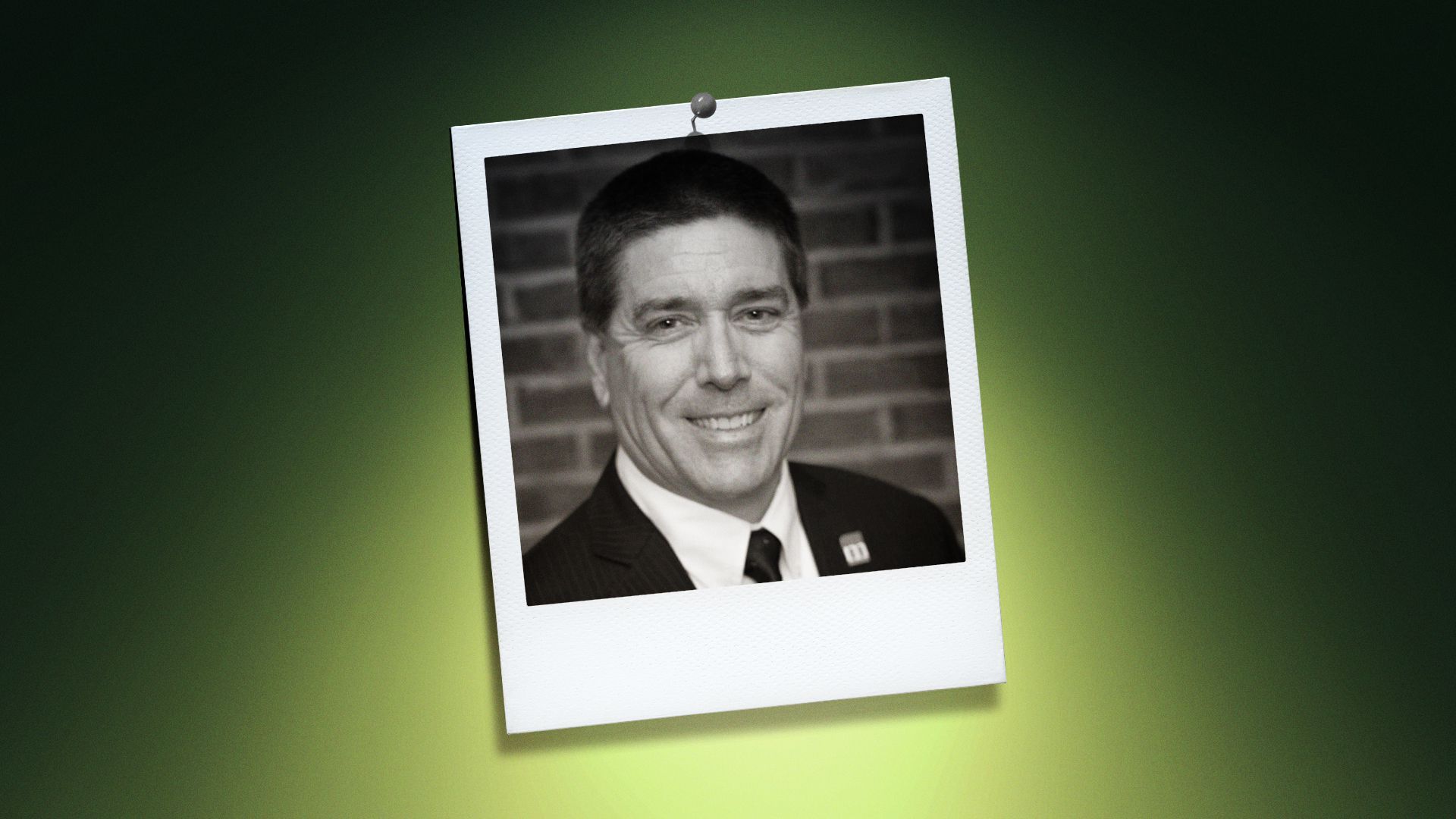 Photo illustration of Morrisville, NC Mayor TJ Cawley, in the center of a Polaroid photo under a green spotlight.