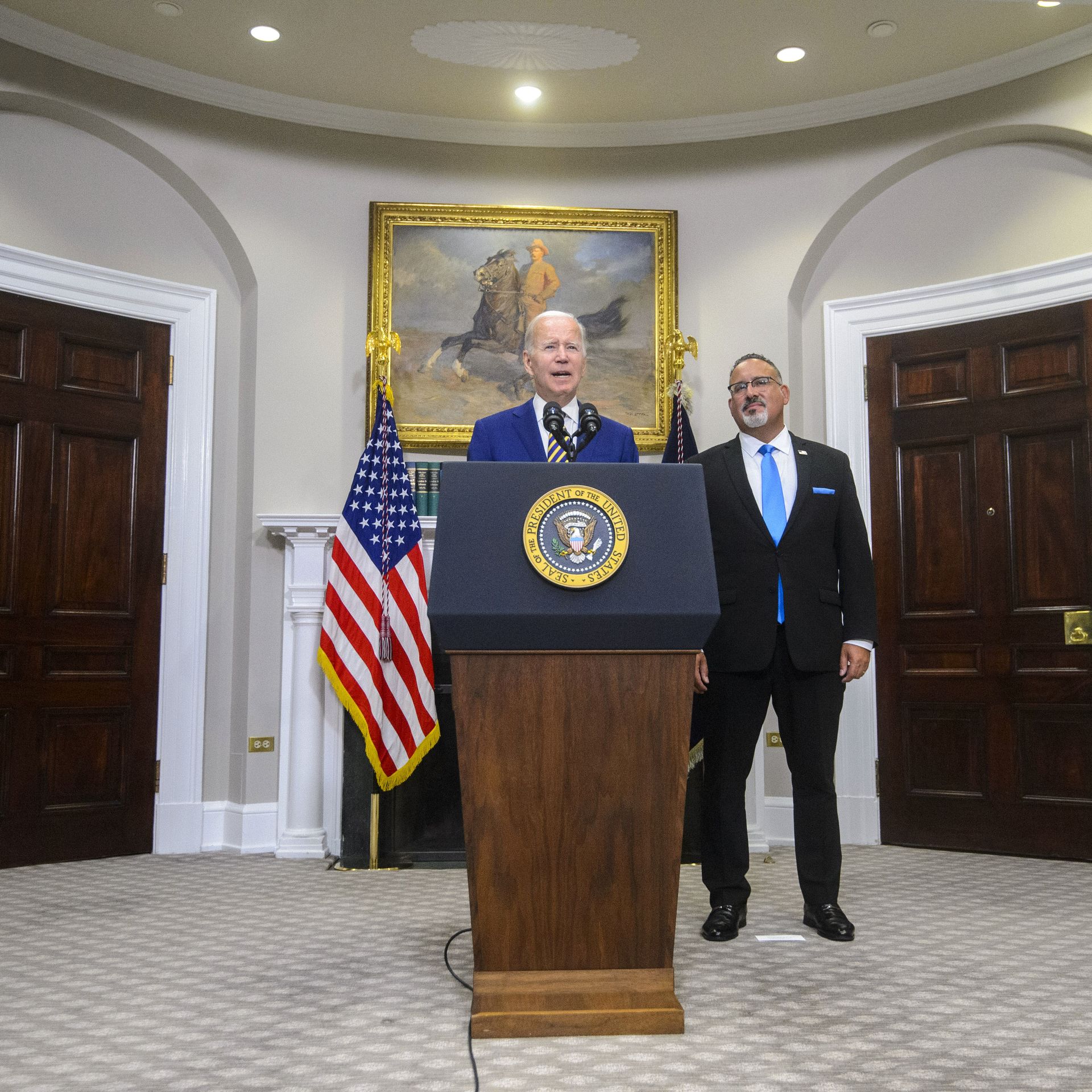 President Biden with Secretary of Education Miguel Cardona in the White House in August 2022.