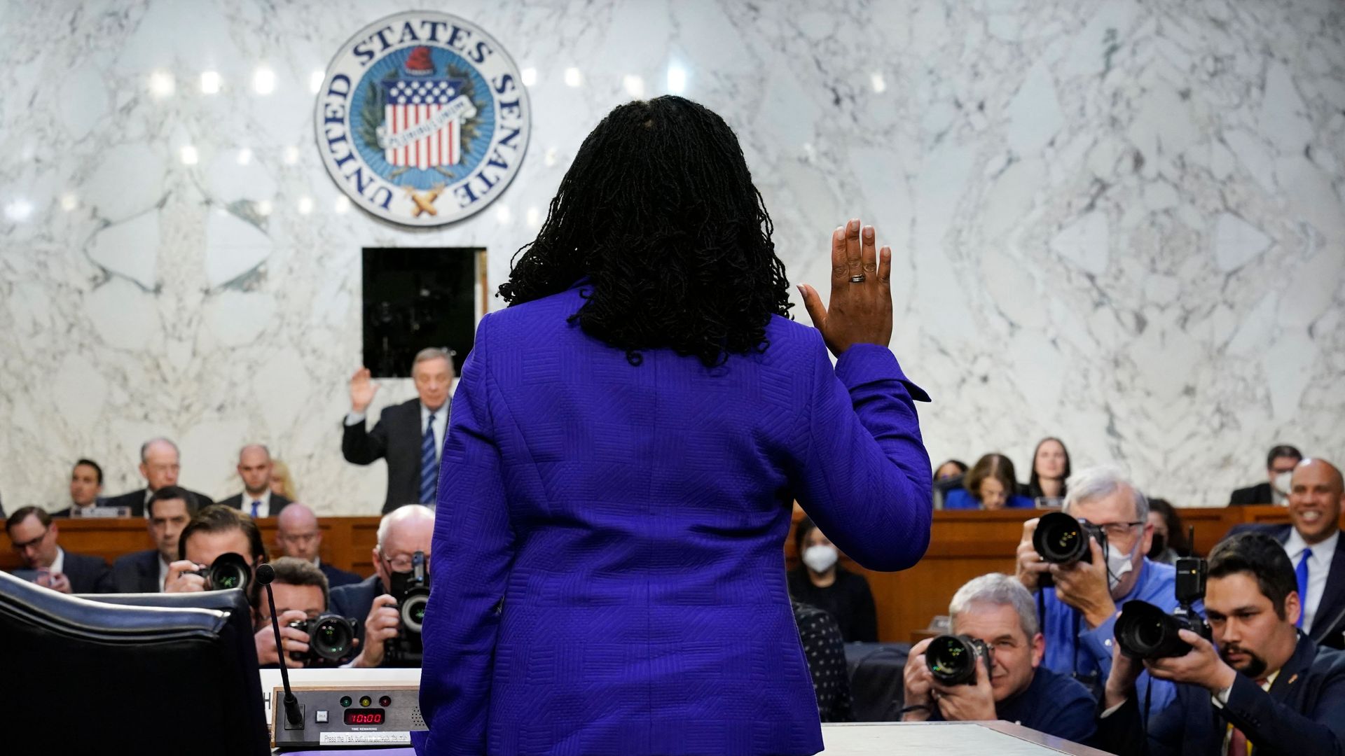 Judge Ketanji Brown Jackson is seen being sworn in for her Supreme Court nomination.