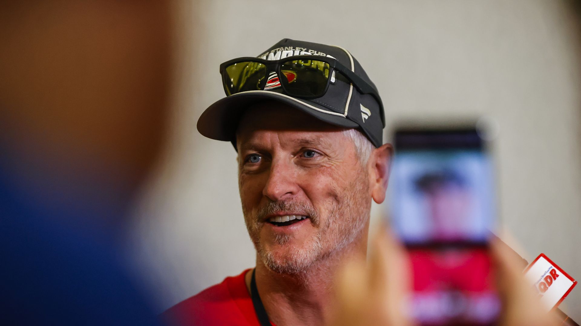 RALEIGH, NORTH CAROLINA - JUNE 20: Owner Tom Dundon addresses the media during the Carolina Hurricanes Stanley Cup Final Victory Parade on June 20, 2026 in Raleigh, North Carolina.(Photo by Jaylynn Nash/Getty Images)