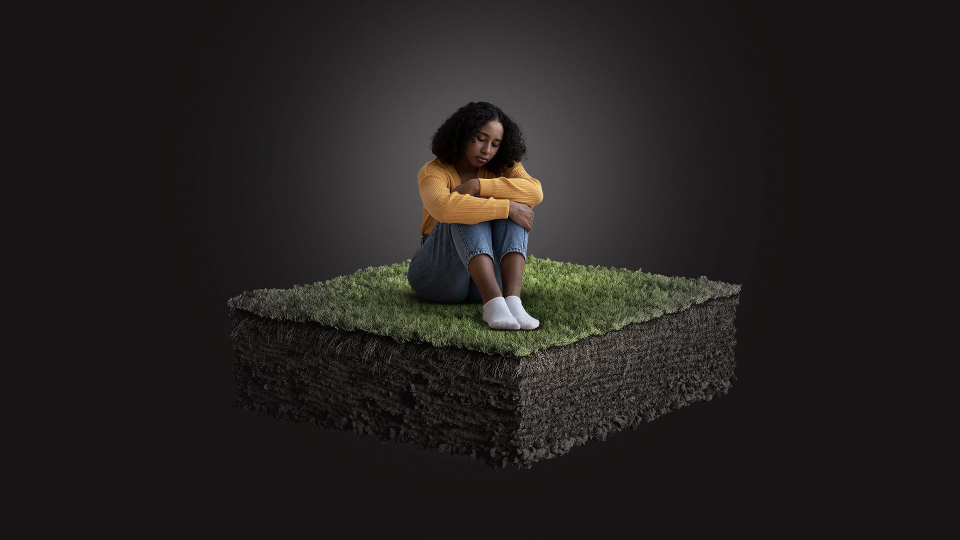 Illustration of a woman sitting somberly atop an isolated square of grass