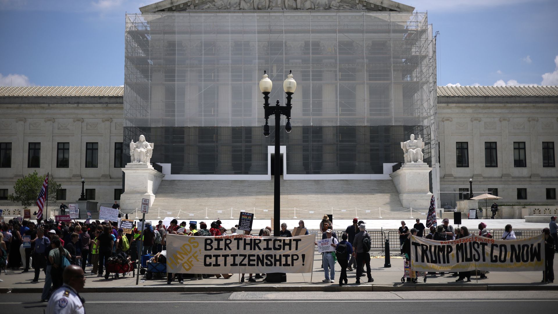 Activists demonstrate during a protest outside the U.S. Supreme Court on May 14, 2025 in Washington, DC. The Supreme Court was scheduled to hear oral argument today on cases whether the Trump administration has the power to end birthright citizenship. (Photo by Alex Wong/Getty Images)