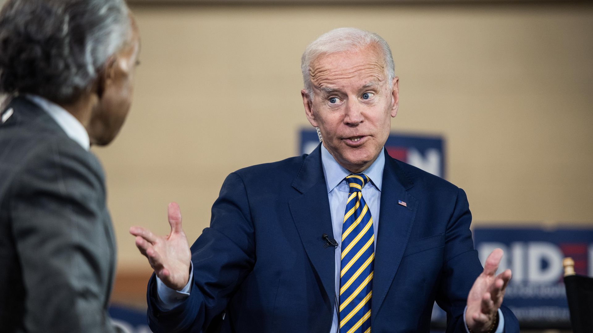  Democratic presidential candidate, former Vice President Joe Biden speaks with Al Sharpton during a television interview during the 2019 South Carolina Democratic Party State Convention on June 22.