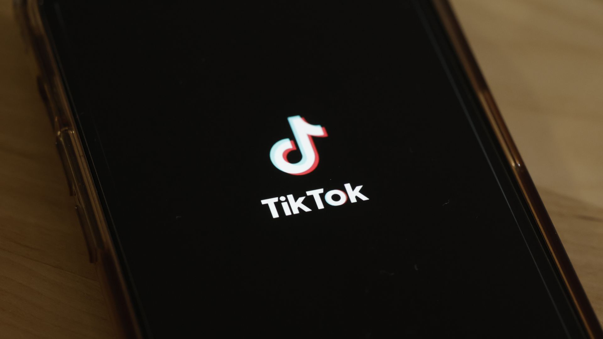 TikTok's logo visible on an iPhone 
