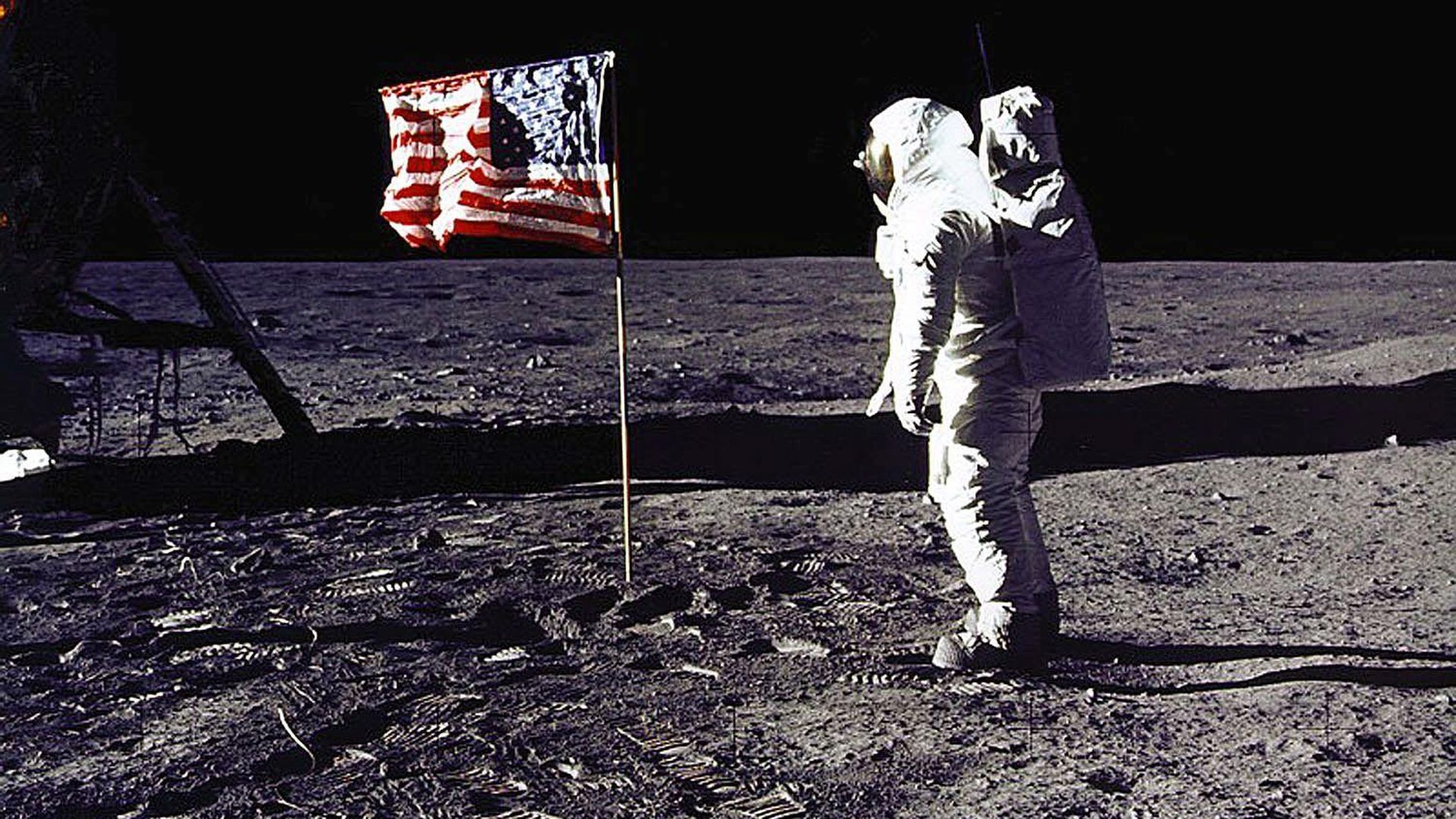 This 20 July 1969 file photo released by NASA shows astronaut Edwin E. "Buzz" Aldrin, Jr. saluting the US flag on the surface of the Moon during the Apollo 11 lunar mission.
