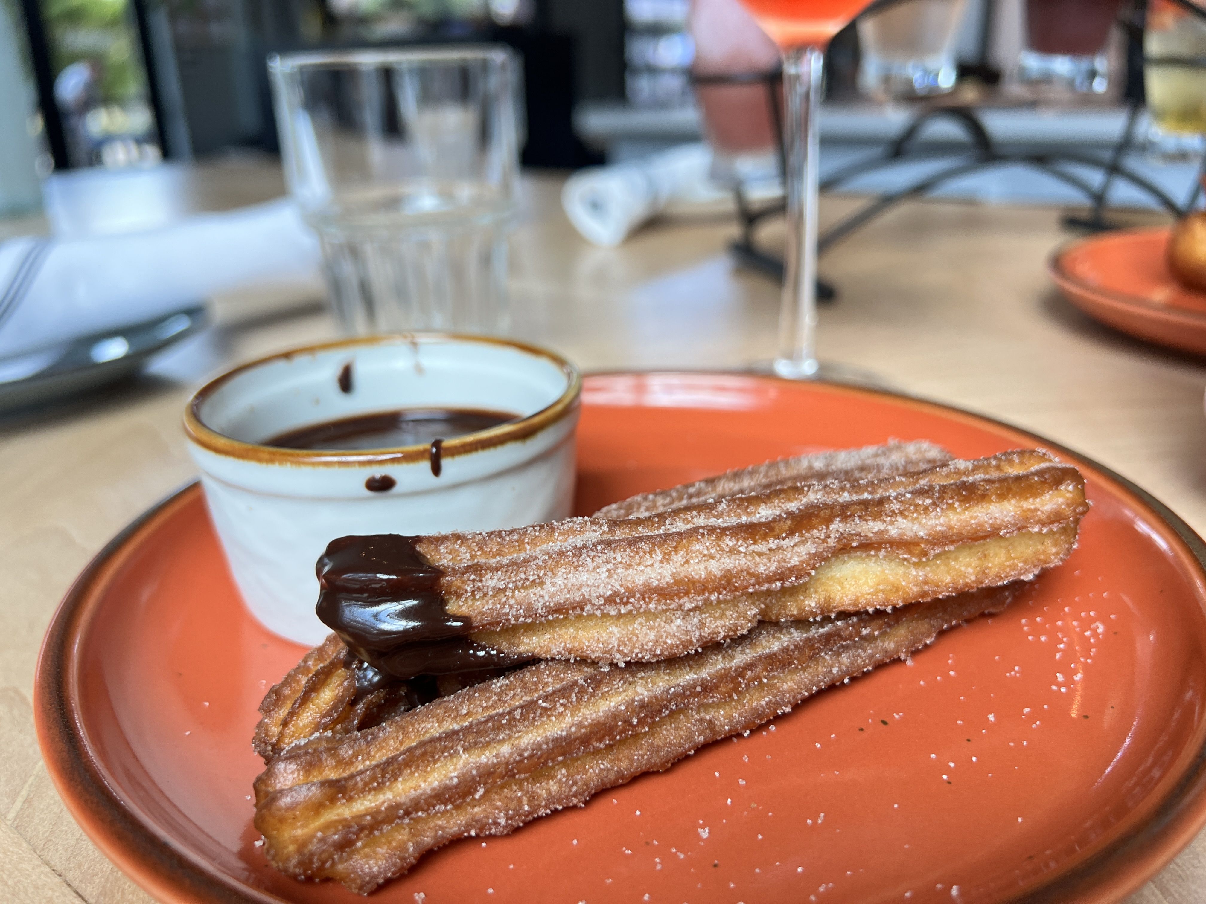 churros dipped in chocolate