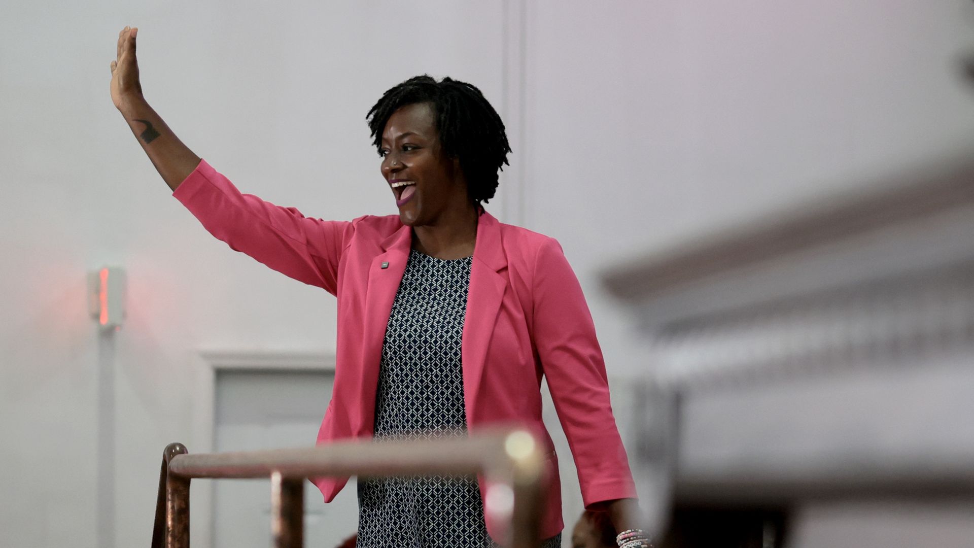 Angie Nixon waving.