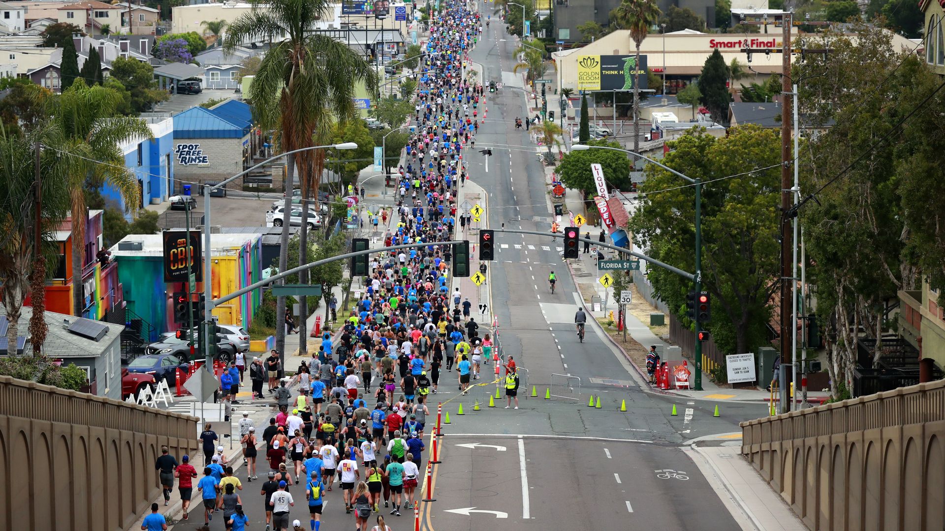 Runners in the Rock 'n' Roll San Diego Marathon and Half Marathon make their way along University Ave. in North Park on Sunday, June 5, 2022. (K.C. Alfred/ The San Diego Union-Tribune via Getty Images)