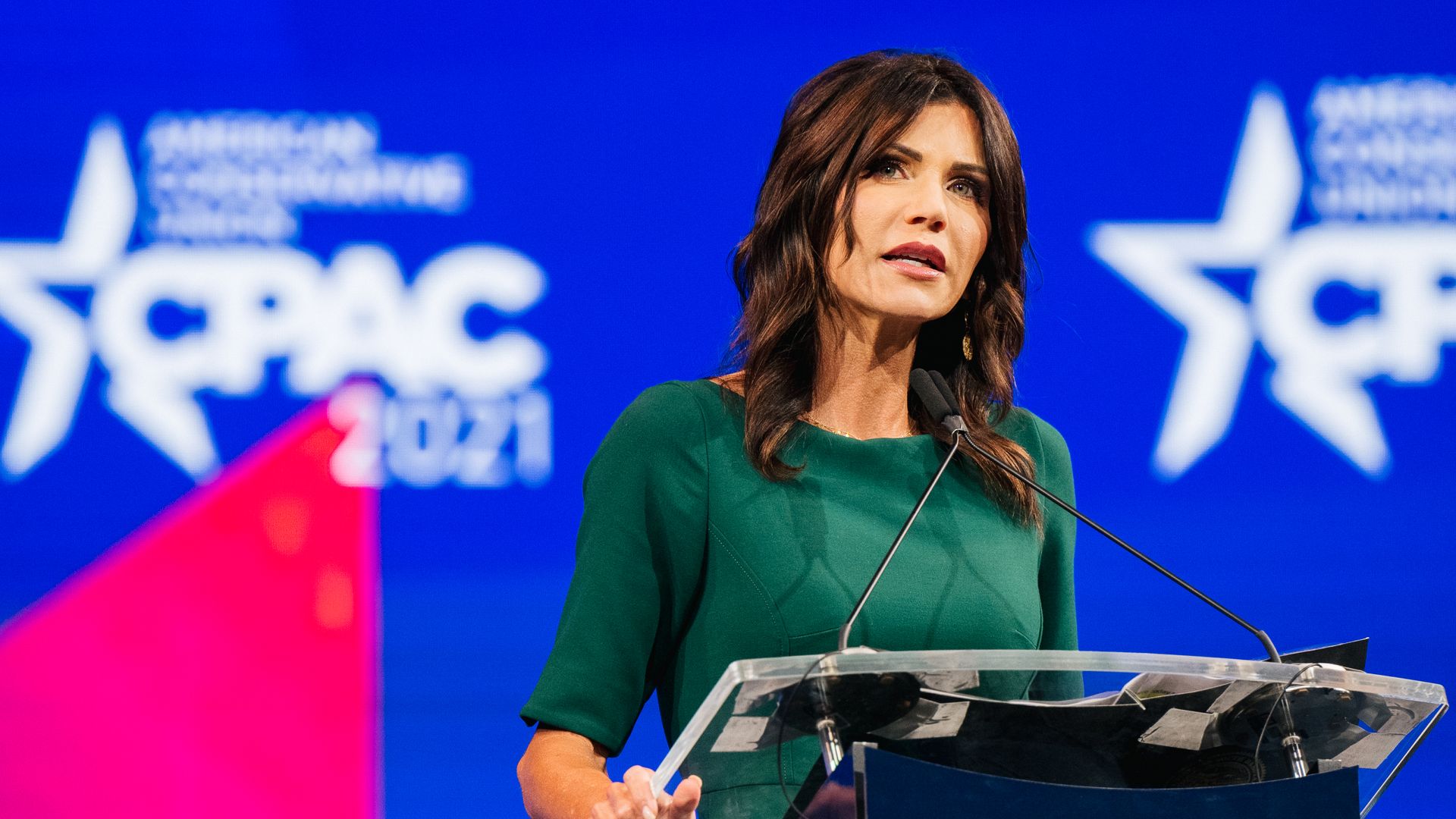 Photo of Kristi Noem speaking from a podium