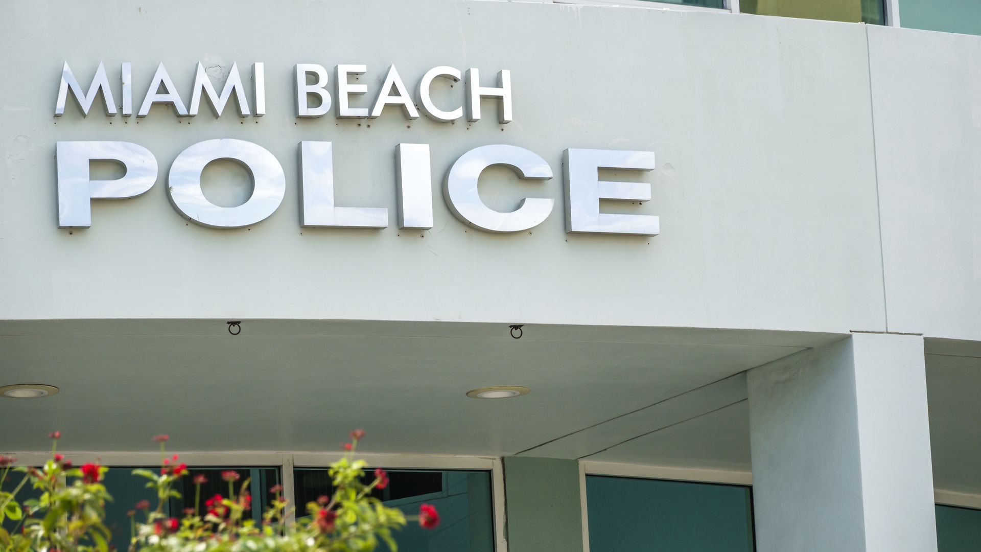 Miami Beach, Florida, Washington Avenue, police station exterior modern building facade with metallic letters spelling MIAMI BEACH POLICE. (Photo by: Jeffrey Greenberg/Universal Images Group via Getty Images)
