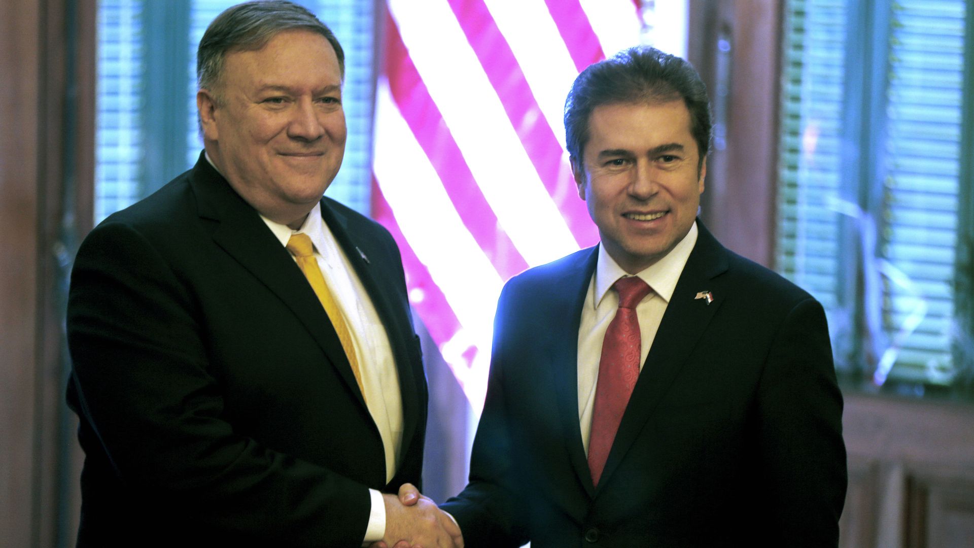 Mike Pompeo shaking hands with Paraguay's foreign minister