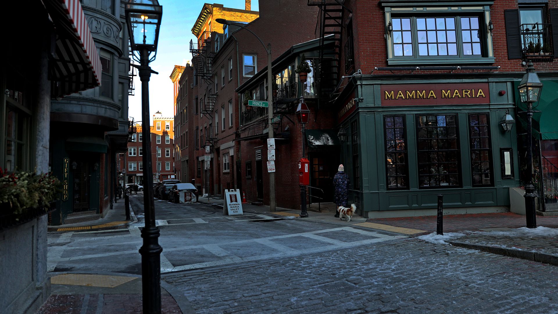 A shot of Boston's North End neighborhood with its cobblestone streets and restaurants like Mamma Maria.