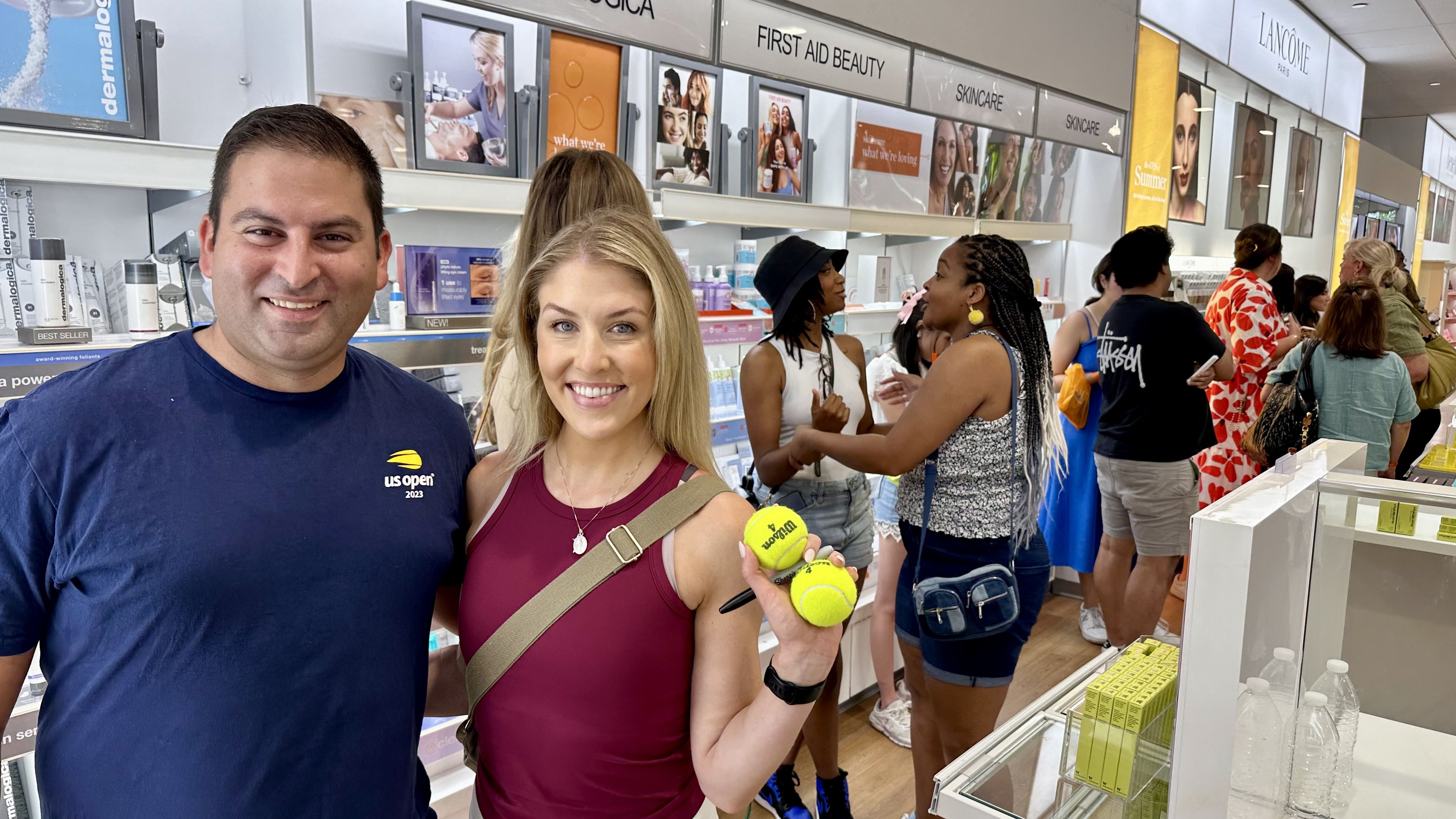Photo shows people waiting in line to take pictures with Serena Williams.