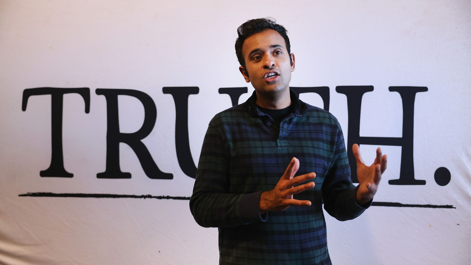 Republican presidential candidate businessman Vivek Ramaswamy speaks to the press following a campaign event on October 20, 2023 in Fort Madison, Iowa.