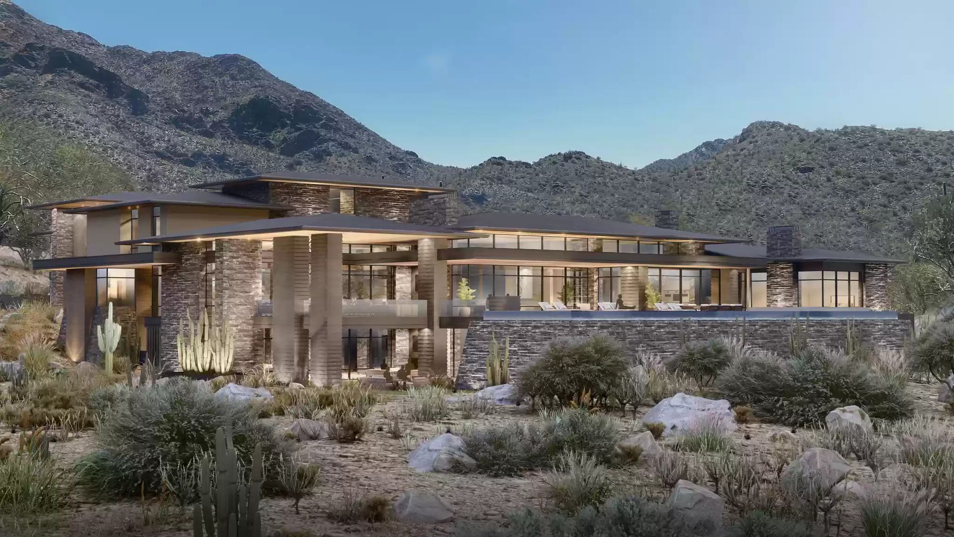 An image of a massive house in desert foothills