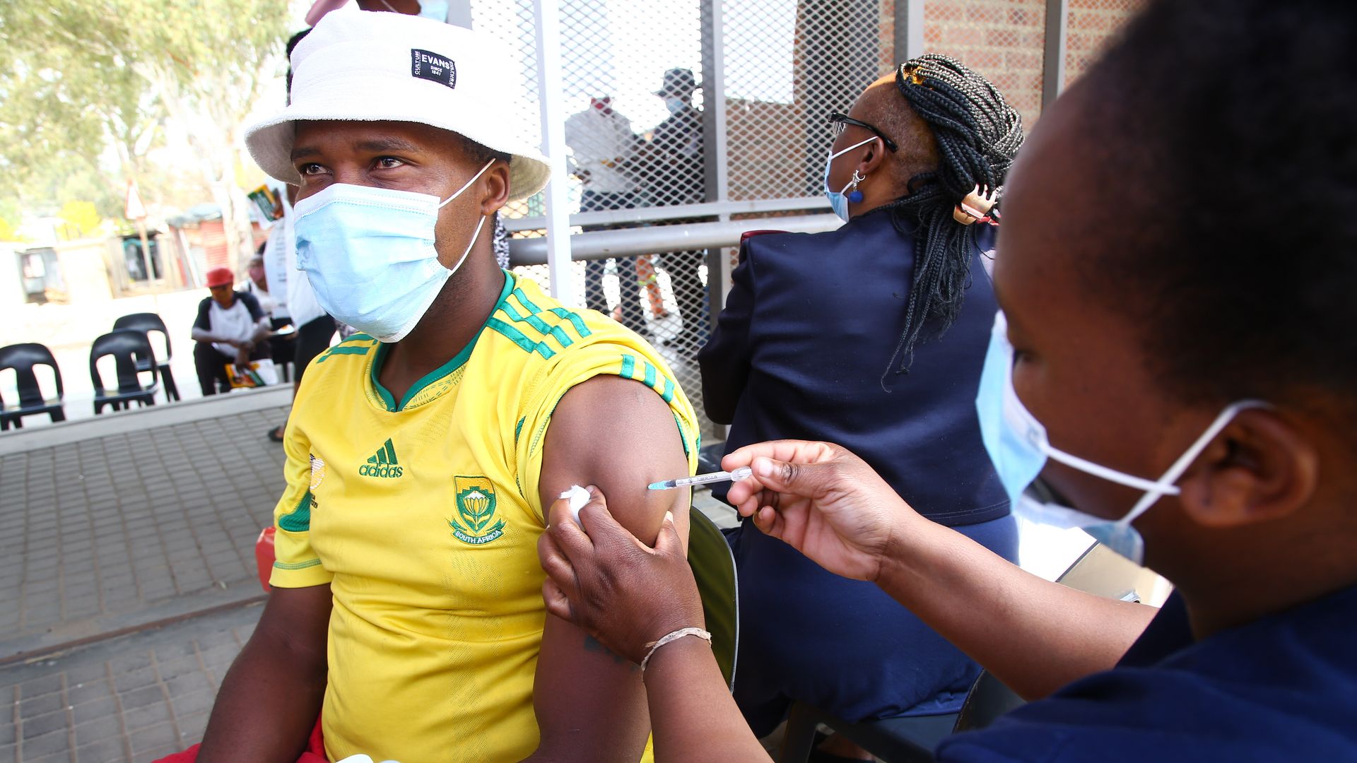 A person receives a vaccine in South Africa