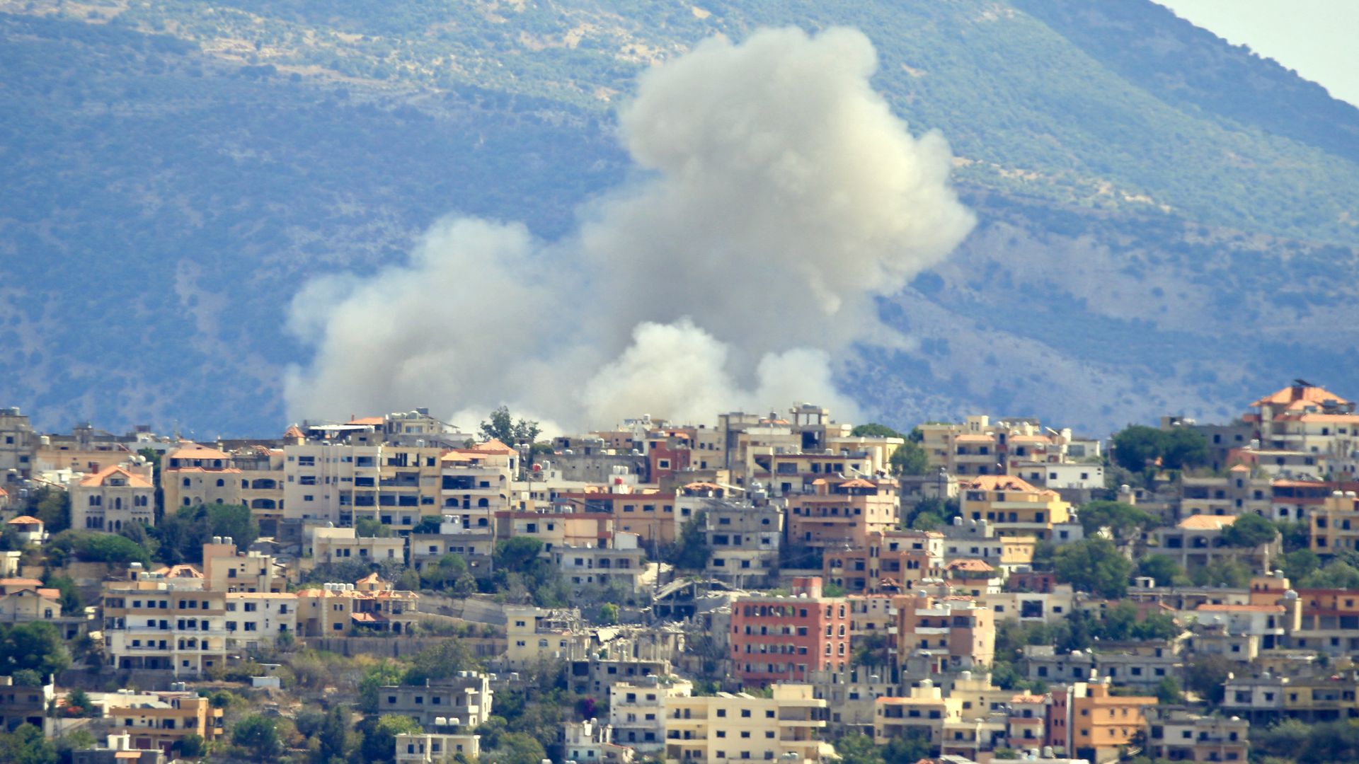 Smoke billows from the site of an Israeli airstrike in the southern Lebanese village of Khiam near the border on September 19, 2024. 