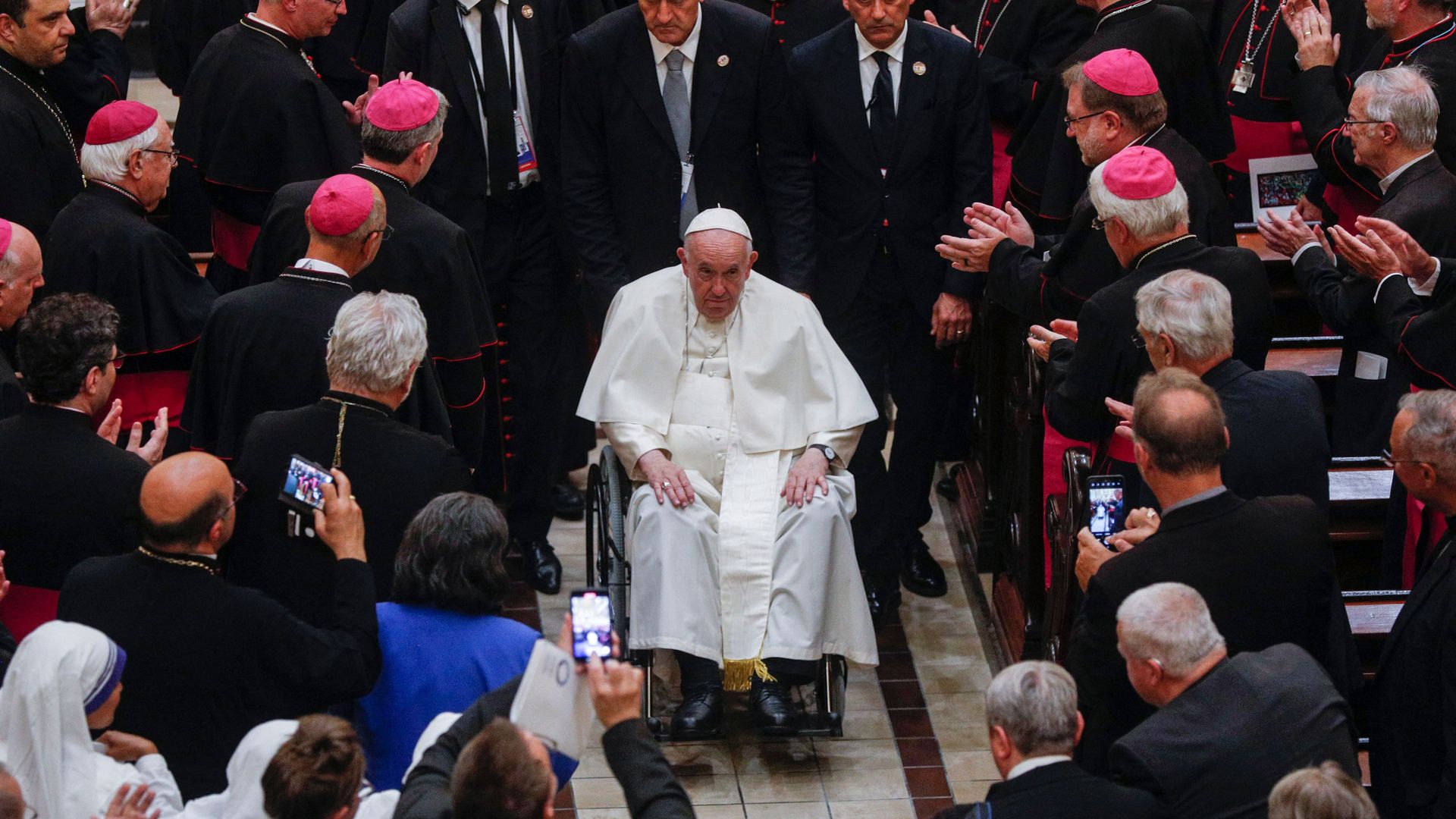 Pope Francis departs after presiding over an evening prayer service at the Basilique-cathedral Notre-Dame in Quebec, Canada.