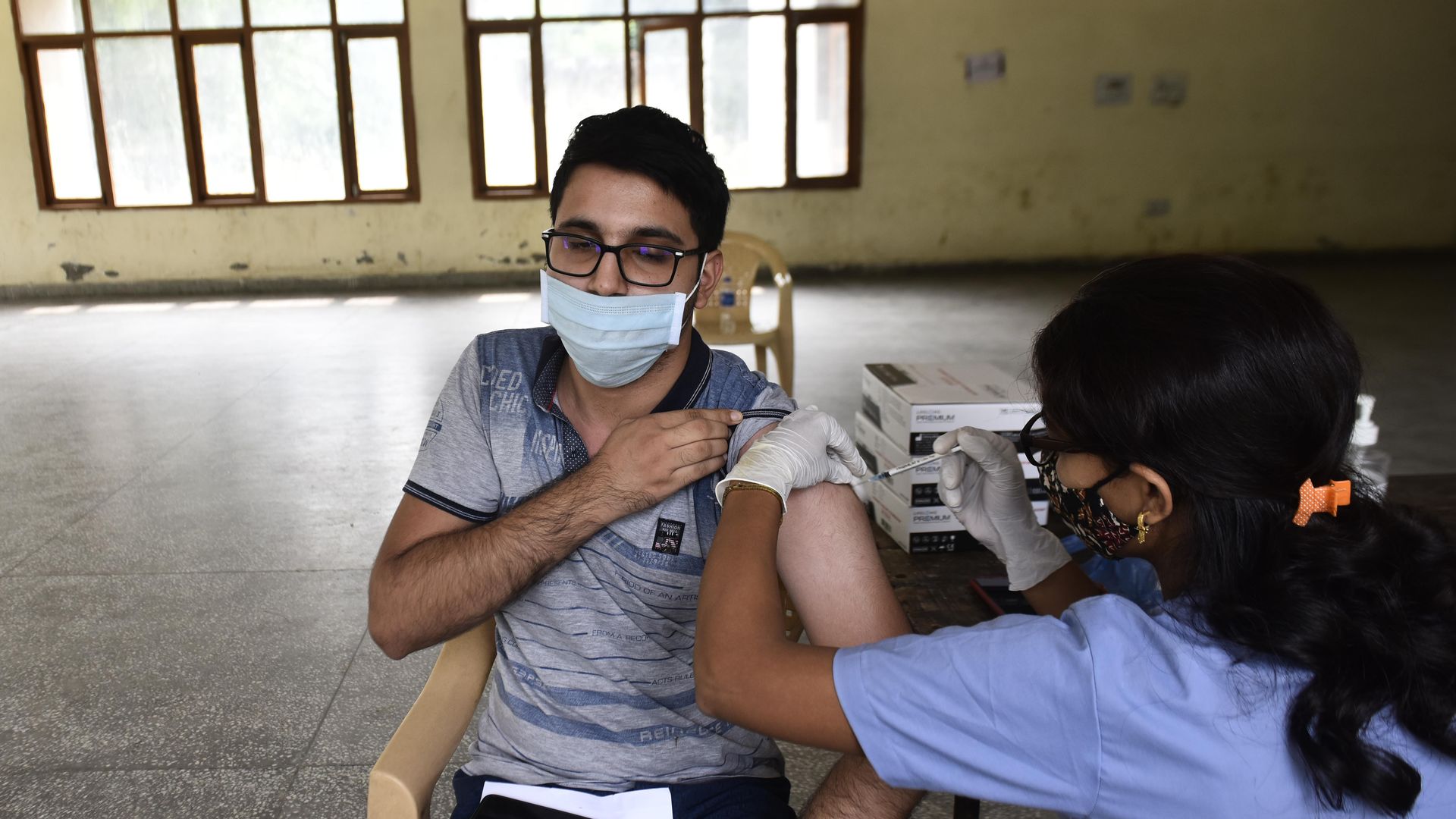 A man receiving his second vaccine dose in India