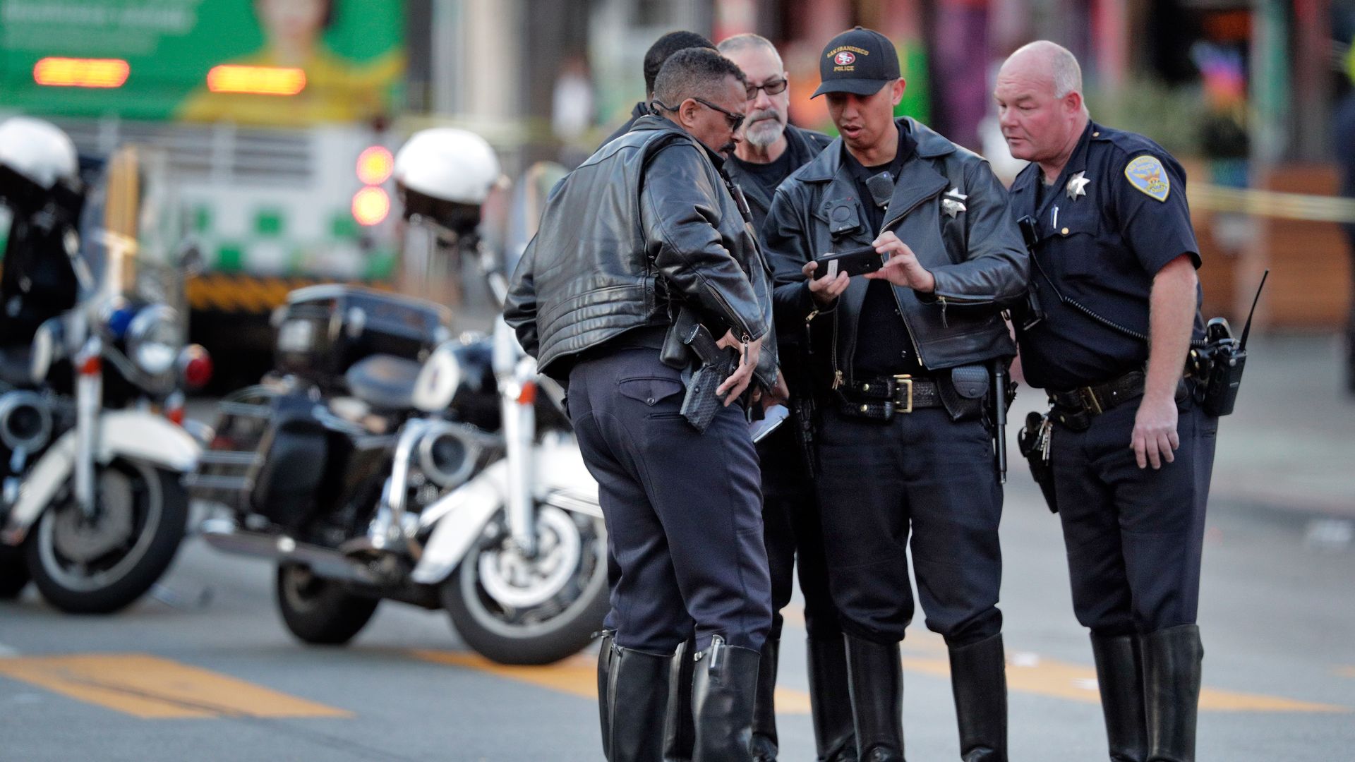 Police officers standing in the street