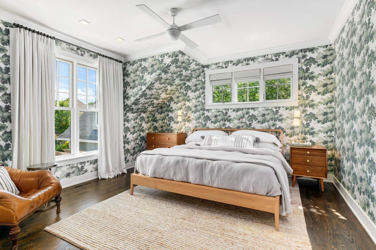primary bedroom with funky wallpaper