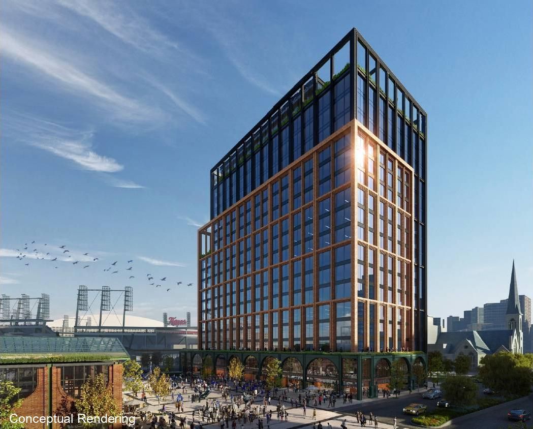 A rendering shows a tall office building with people milling around in front of Comerica Park.