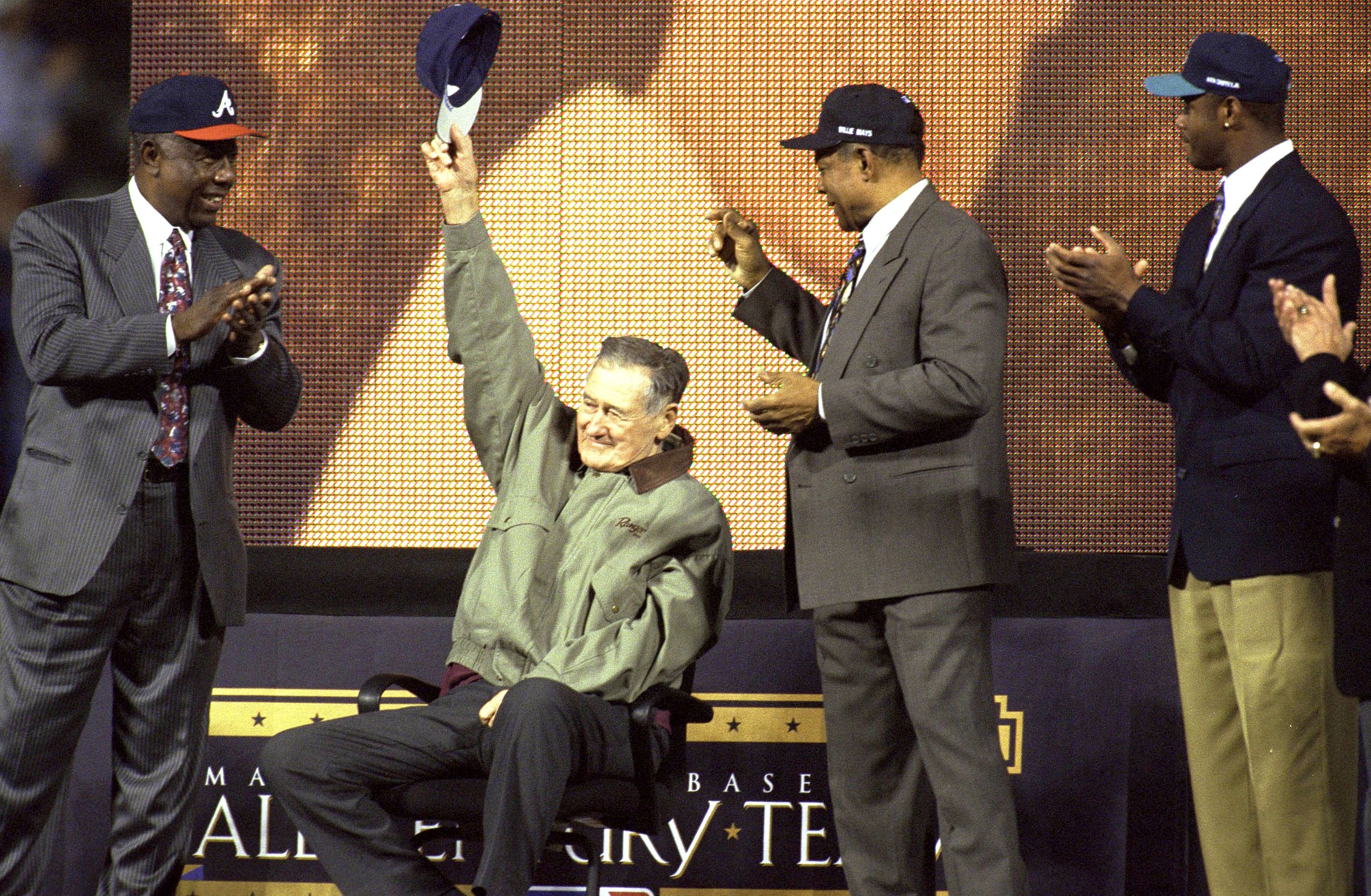 Former Boston Red Sox and Hall of Famer Ted Williams tipping his cap during All Century Team ceremony before Atlanta Braves vs New York Yankees game at Turner Field. Game 2. Atlanta