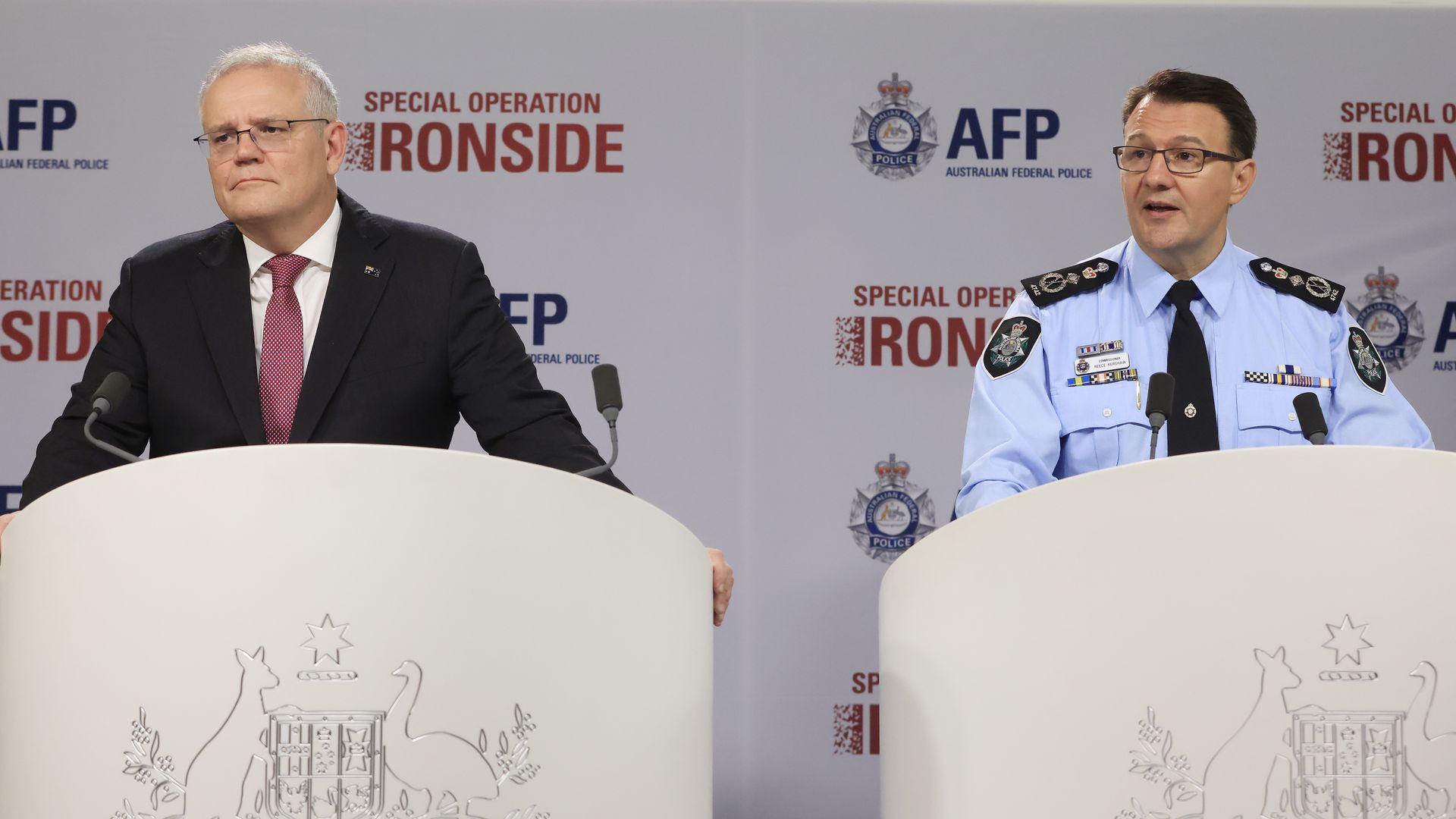 Prime Minister Scott Morrison and AFP Commissioner Reece Kershaw speak to the media on June 8.