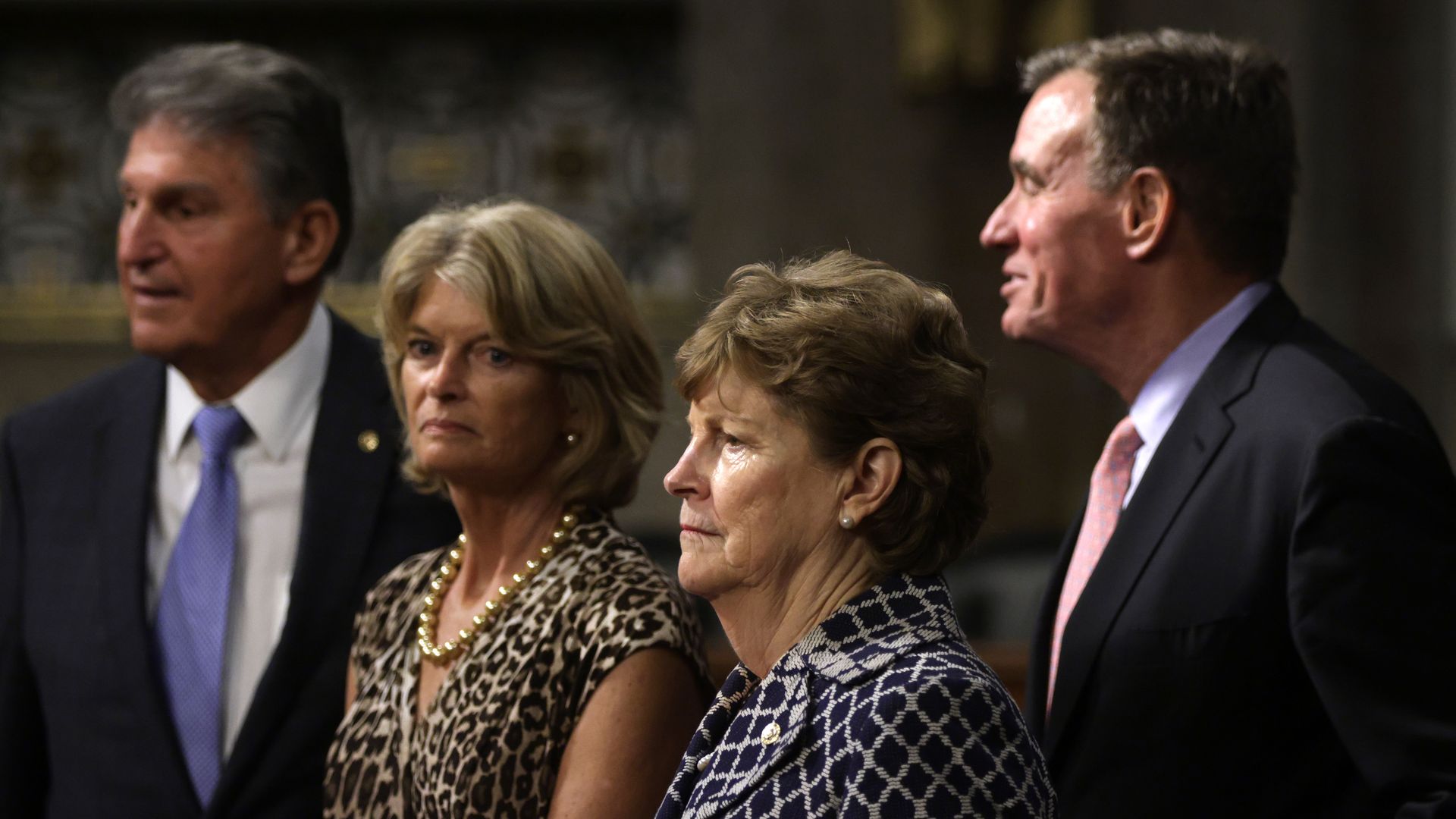 Four senators in a room