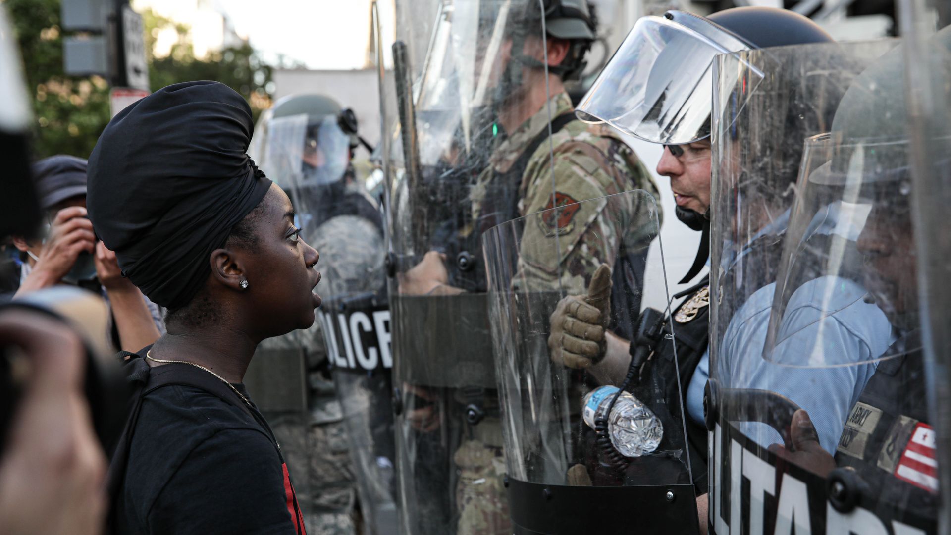 Security forces face protesters in Lafayette Park on June 1.