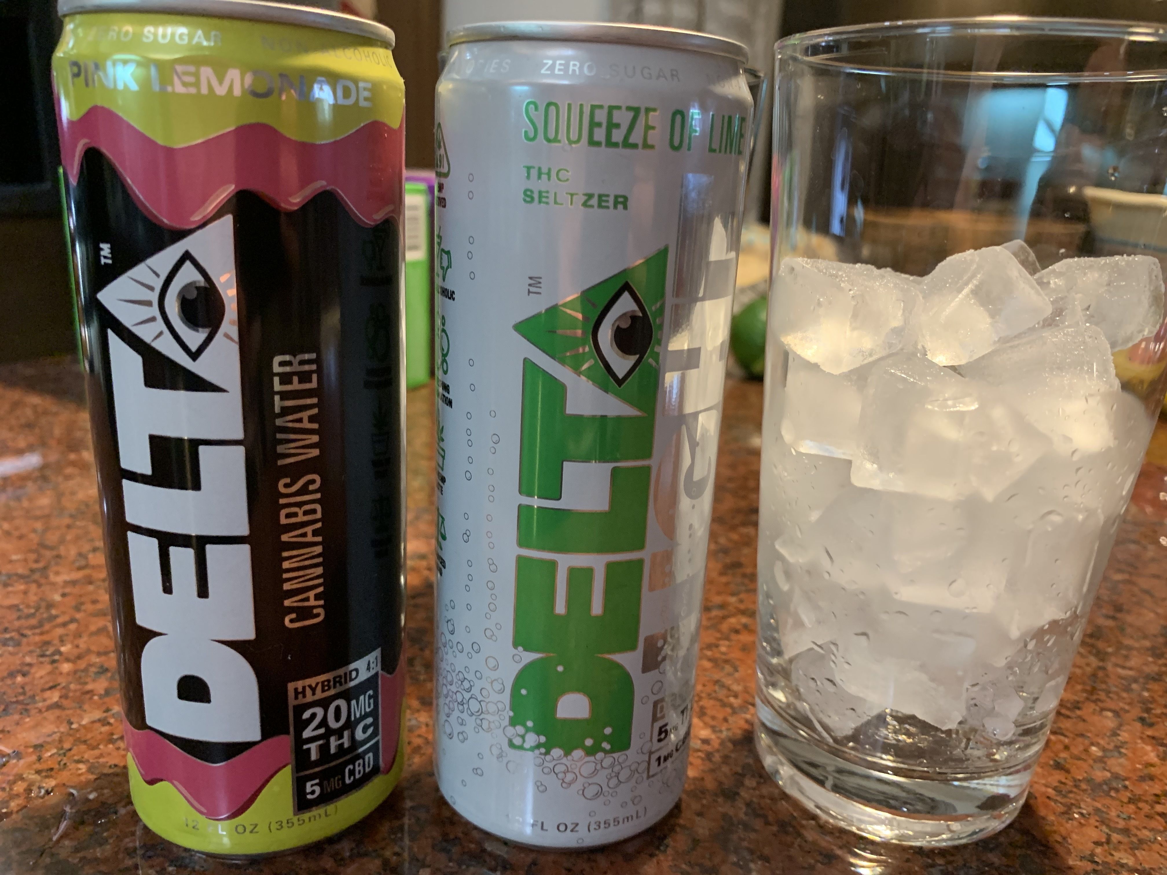 Photo of two cans of seltzer and a glass of ice 