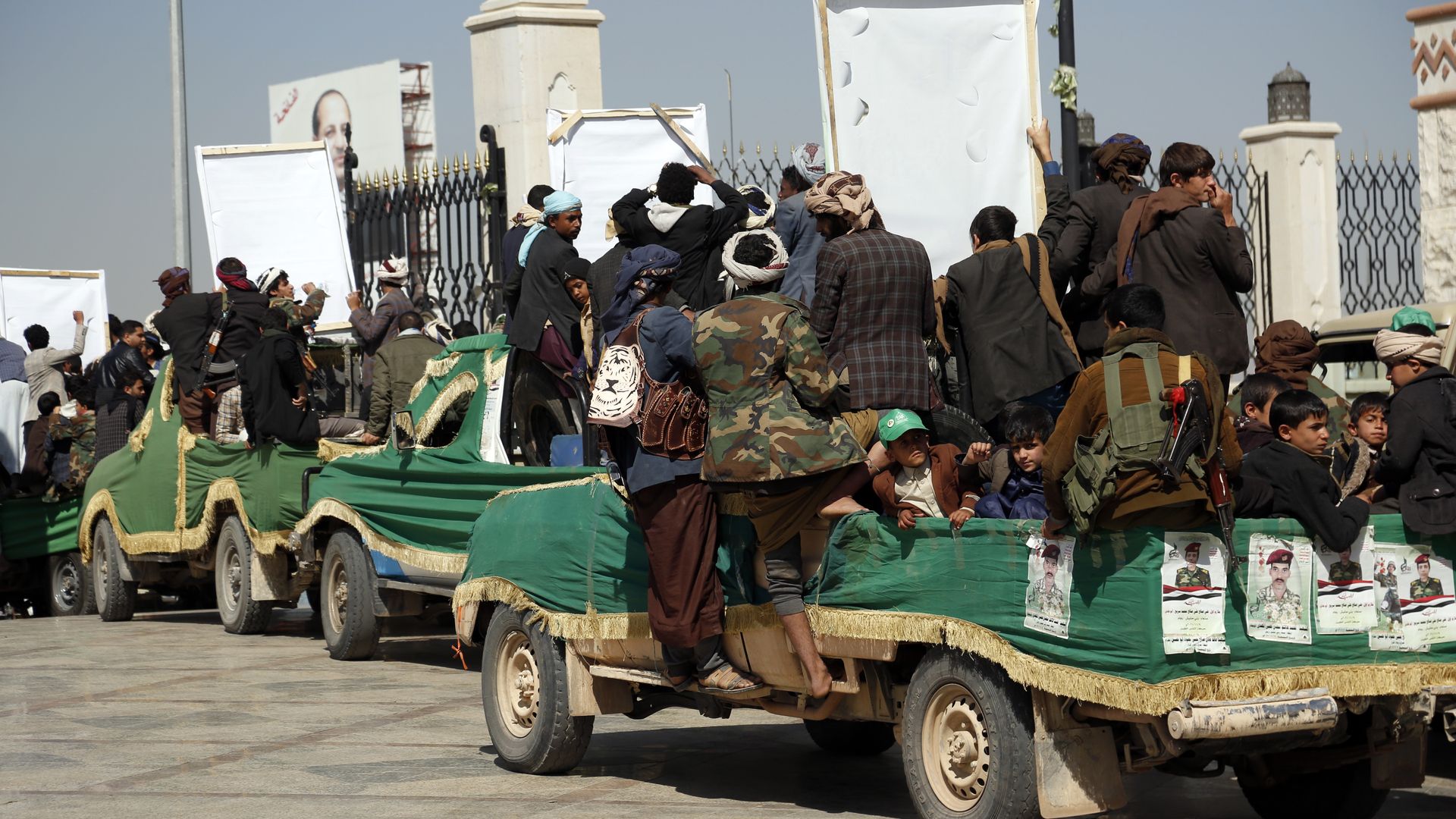 Houthi followers ride vehicles, that carry coffins of Houthi fighters, who were killed in recent intensified fighting around Yemen's oil-rich Marib city,