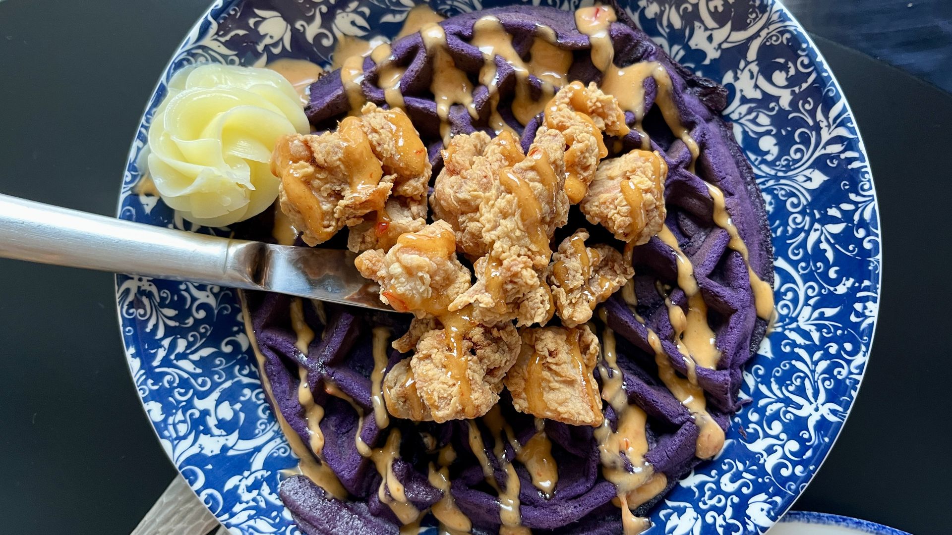 purple waffle with fried chicken